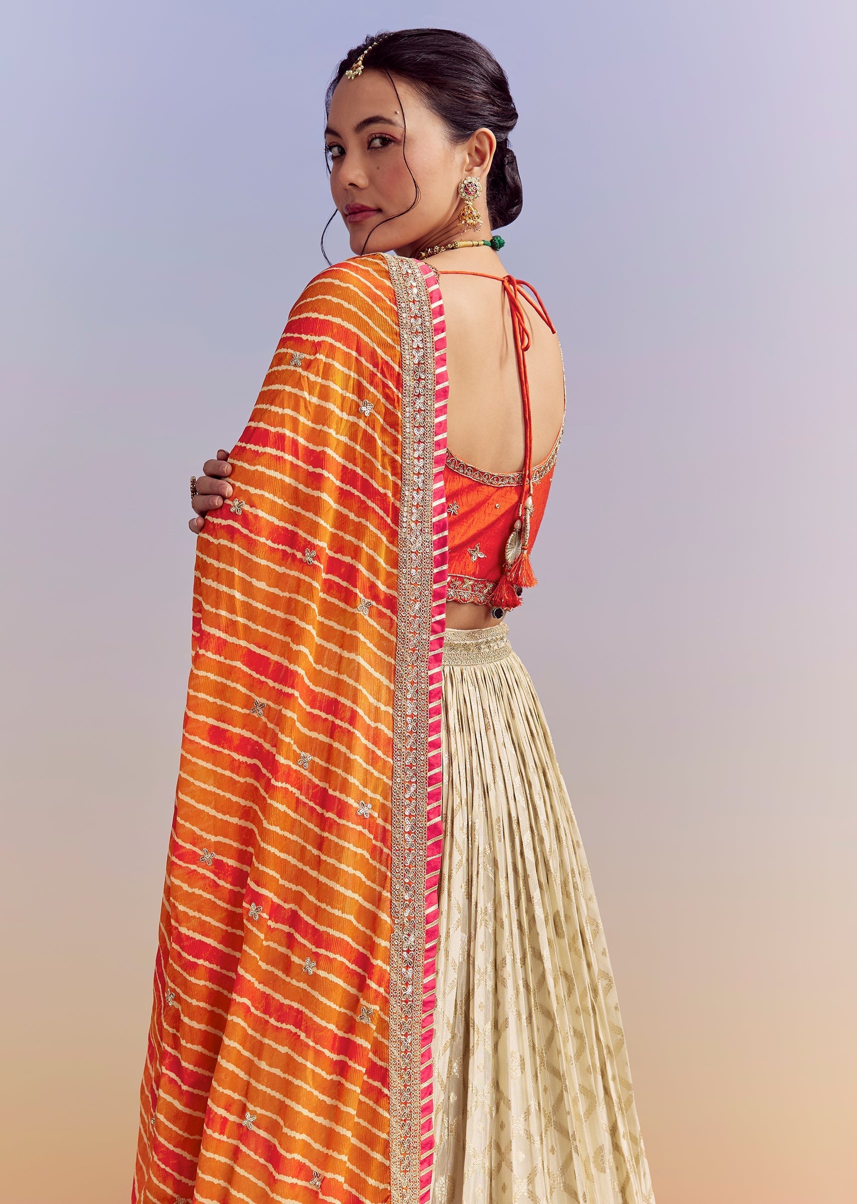 Orange_Brocade_Silk_Bridesmaid_Lehenga_With_Leheriya_Dupatta-sg308821-1_2.jpg
