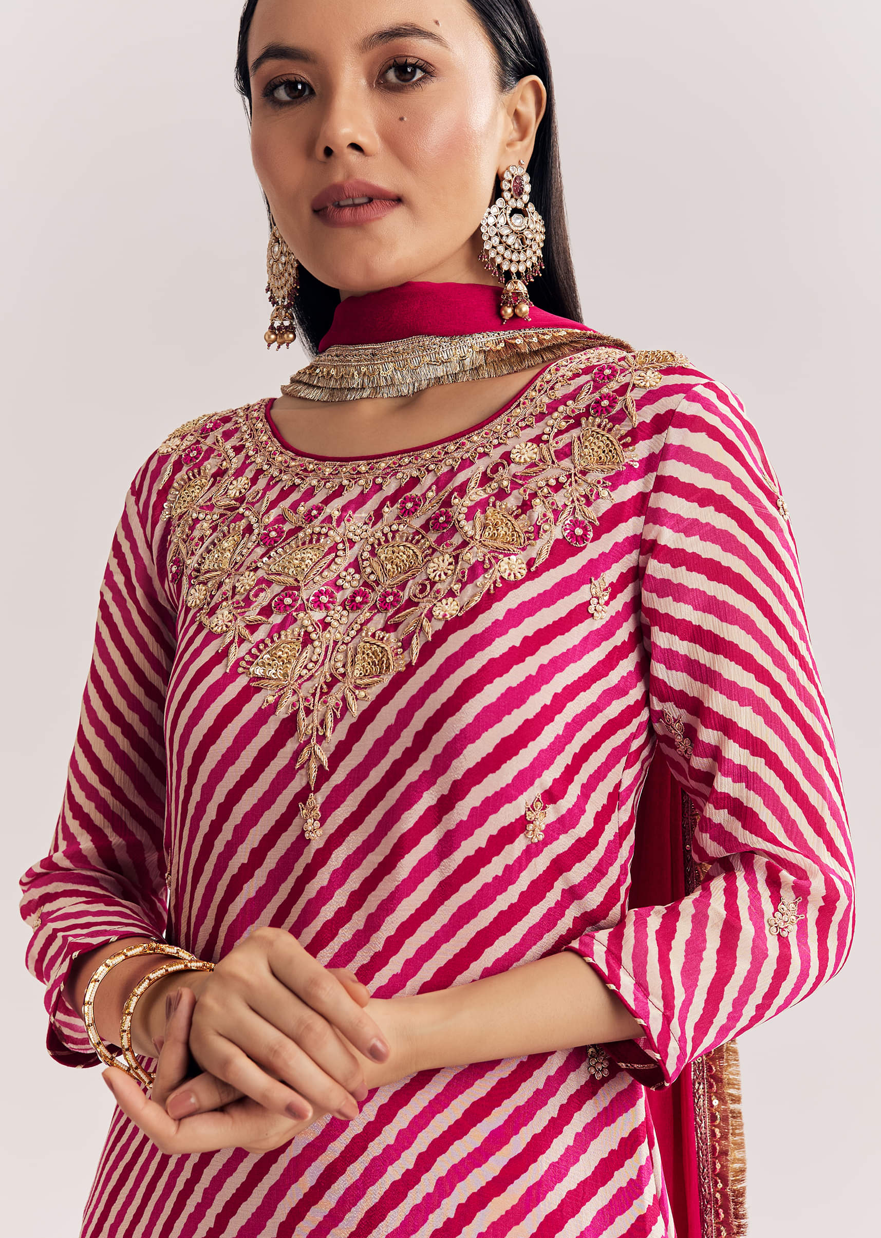 bright-orange-bandhani-kurta-palazzo-suit-with-sequins-and-zardosi-work-sg318634-1_ae475853-a873-4ab4-81b8-2fde3087489f.jpg