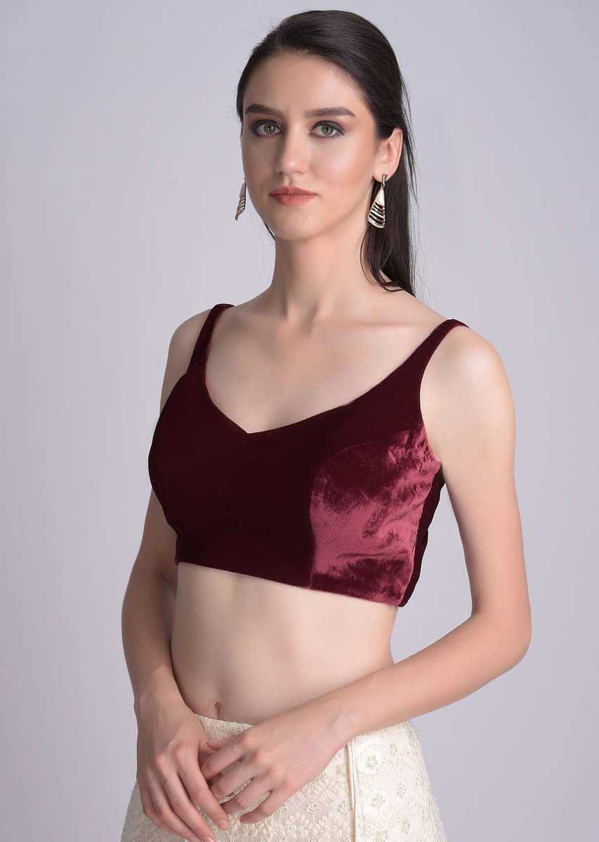 burgundy-sleeveless-blouse-in-velvet-with-curved-v-neckline-online-kalki-fashion-1520172y_5_18617141-3a76-4b90-ad3c-d231914fb5a8.jpg
