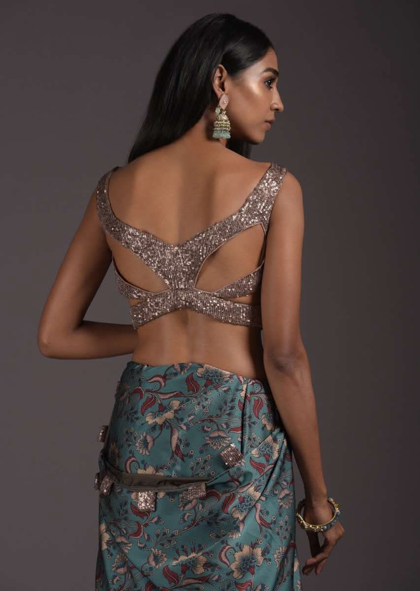 champagne-gold-sleeveless-blouse-in-sequins-fabric-with-cutouts-on-the-sides-and-back-online-kalki-fashion-m001blra346y-sg52183_1_2161aea0-2cab-4bdc-89e2-42807151caf3.jpg