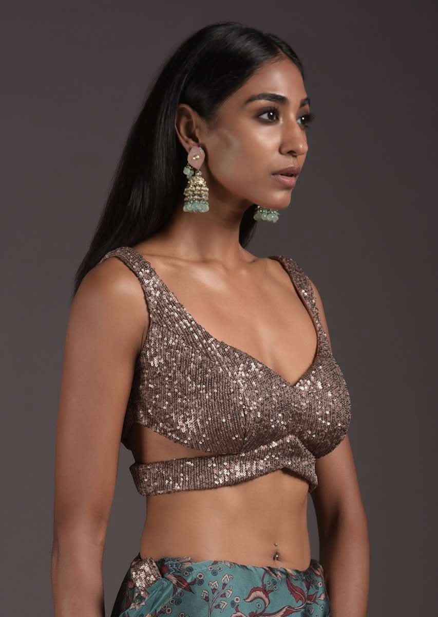 champagne-gold-sleeveless-blouse-in-sequins-fabric-with-cutouts-on-the-sides-and-back-online-kalki-fashion-m001blra346y-sg52183_4_688524a3-7220-4715-924d-d87ef7000f00.jpg