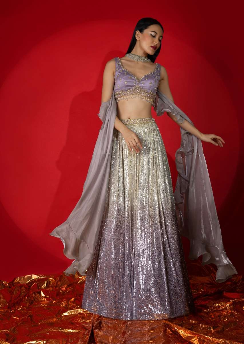 cream-and-lavender-shaded-sequins-lehenga-with-hand-embroidered-lavender-choli-and-ruffle-dupatta-online-kalki-fashion-m001ra522y-sg68390_5_bc284303-9314-4f54-b854-640986e742ae.jpg