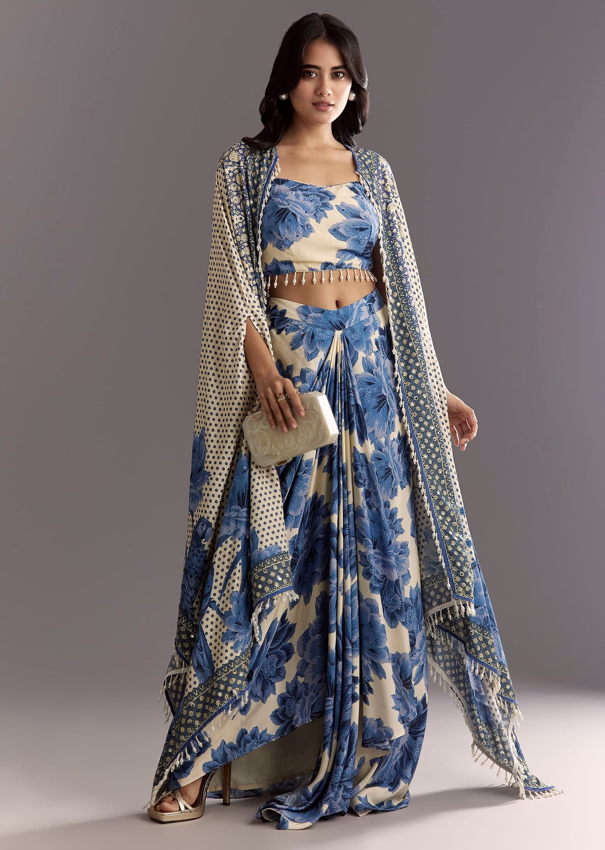 cream-blue-floral-printed-croptop-skirt-with-tassel-bordered-cape-sg308919-3_f05b2657-2aa7-42dd-970e-617504aee713.jpg