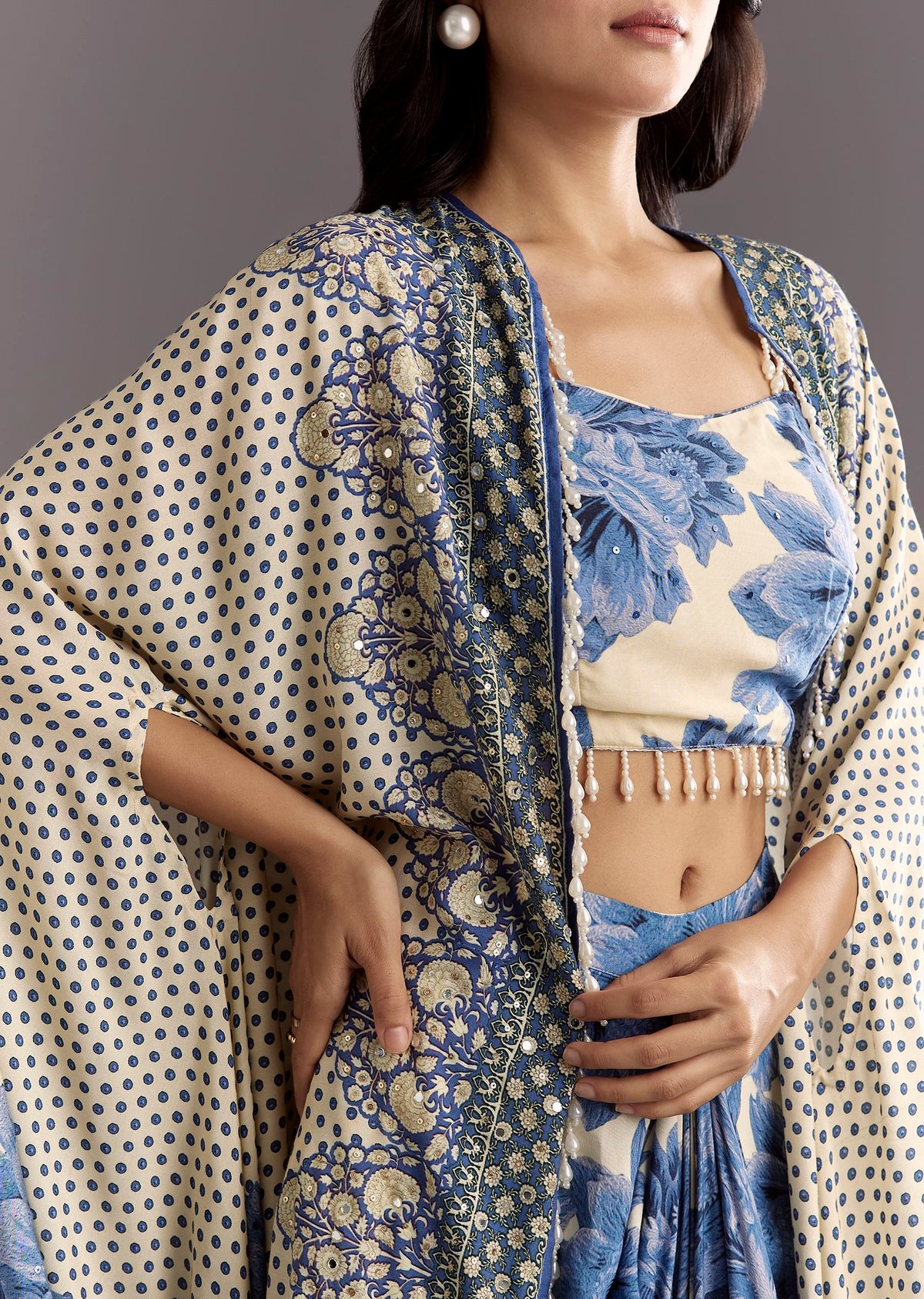 cream-blue-floral-printed-croptop-skirt-with-tassel-bordered-cape-sg308919-4_9c32f64d-2e2e-48ea-8199-ff52d7cc5088.jpg