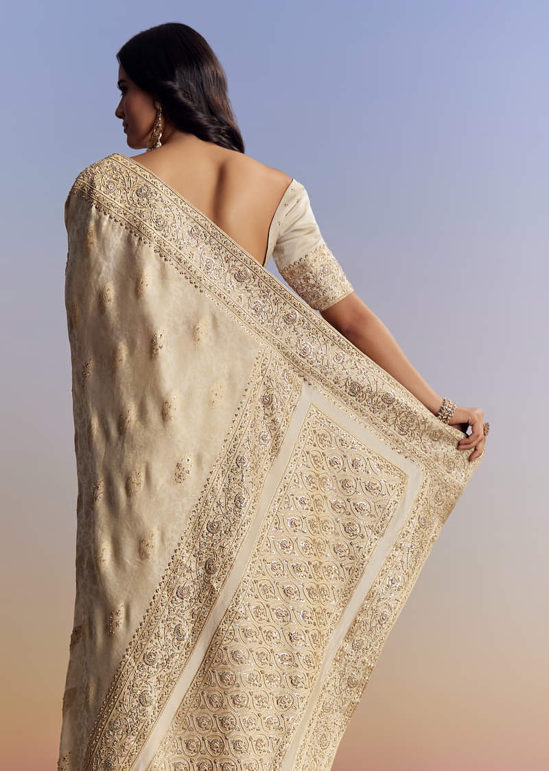 cream-jacquard-silk-saree-with-zari-brocade-and-zardosi-embellished-pallu-sg177295-6_1_eed053ee-9012-466f-9831-29c8568aa532.jpg