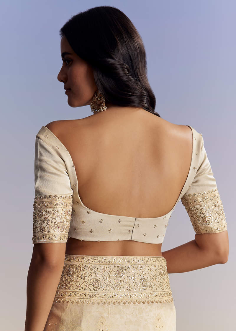 cream-jacquard-silk-saree-with-zari-brocade-and-zardosi-embellished-pallu-sg177295-8_1_b1045230-cf6f-45fd-8c95-1a37739c860e.jpg