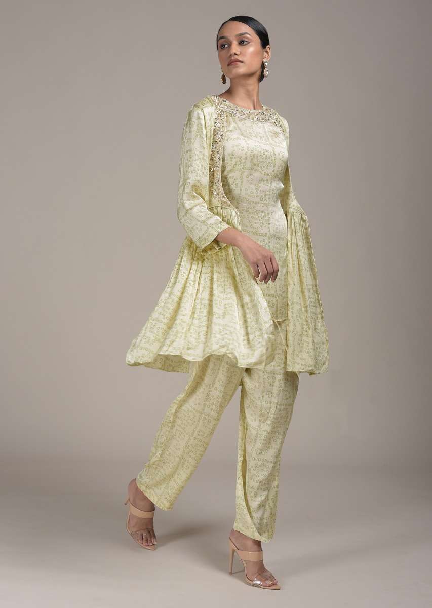 cream-peplum-suit-in-satin-blend-with-bandhani-print-all-over-online-kalki-fashion-d0015050y-sg47255_6_598b6c82-a002-4b72-8600-b01d8118aaa1.jpg