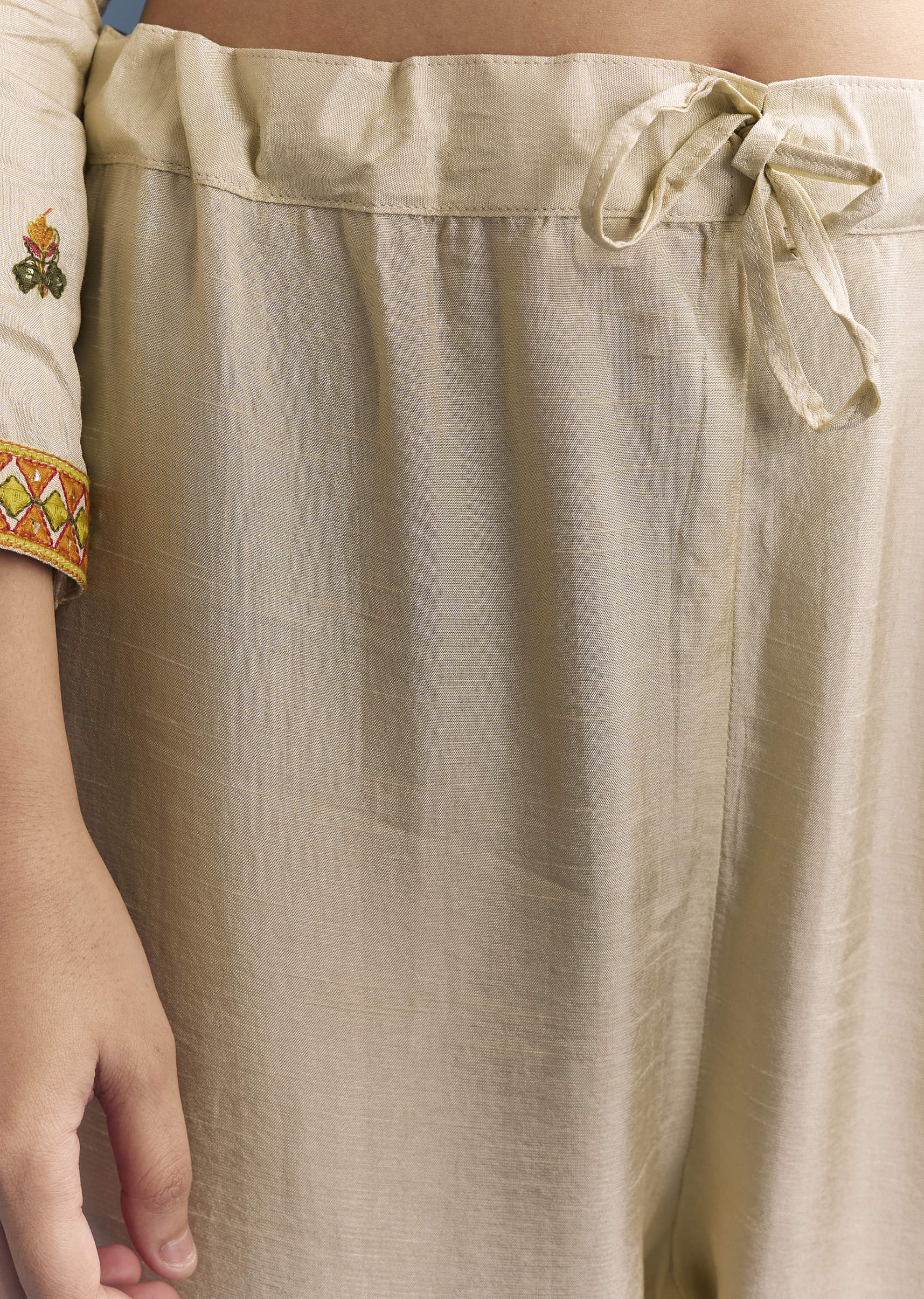 cream-silk-kurta-set-with-delicate-resham-work-6.jpg