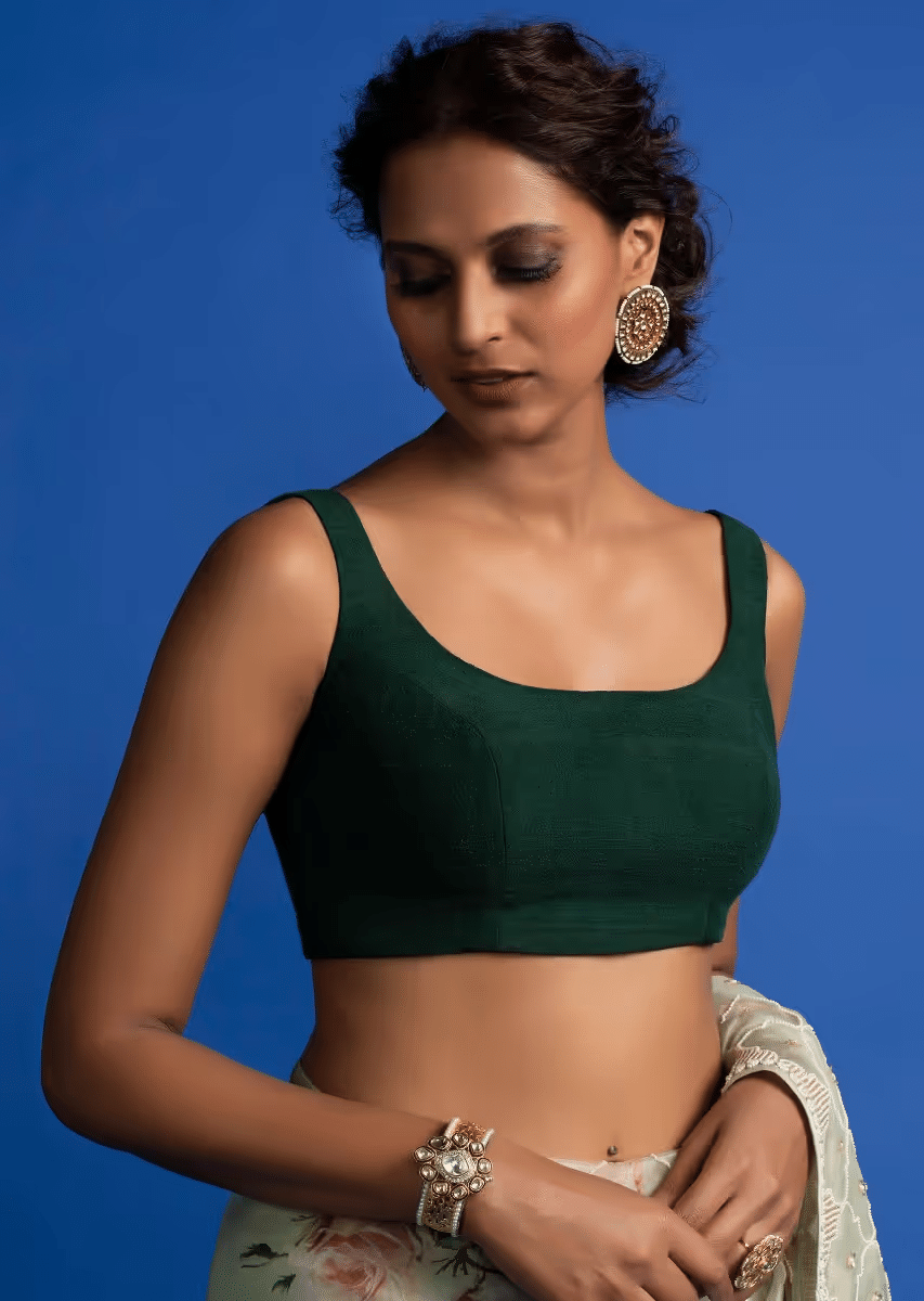 forest_green_sleeveless_blouse_25064cc3-7779-425a-b6e8-09a92dc66208.png