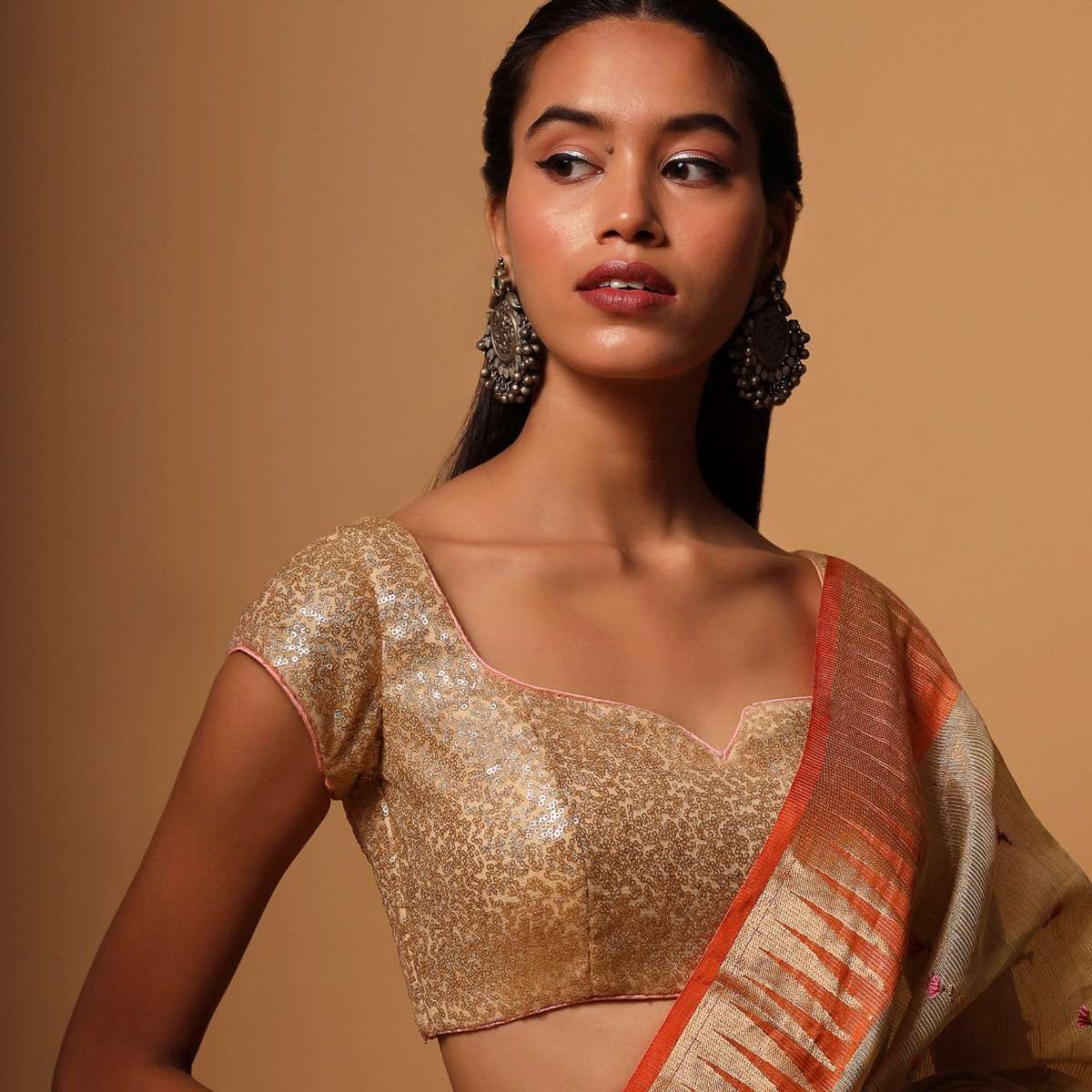 gold-blouse-in-net-with-contrasting-peach-piping-around-the-edges-and-sequins-work-all-over-online-kalki-fashion-m001bldy41y-sg57017_3_1702bcbd-6213-4078-937a-29ebe47d2a76.jpg