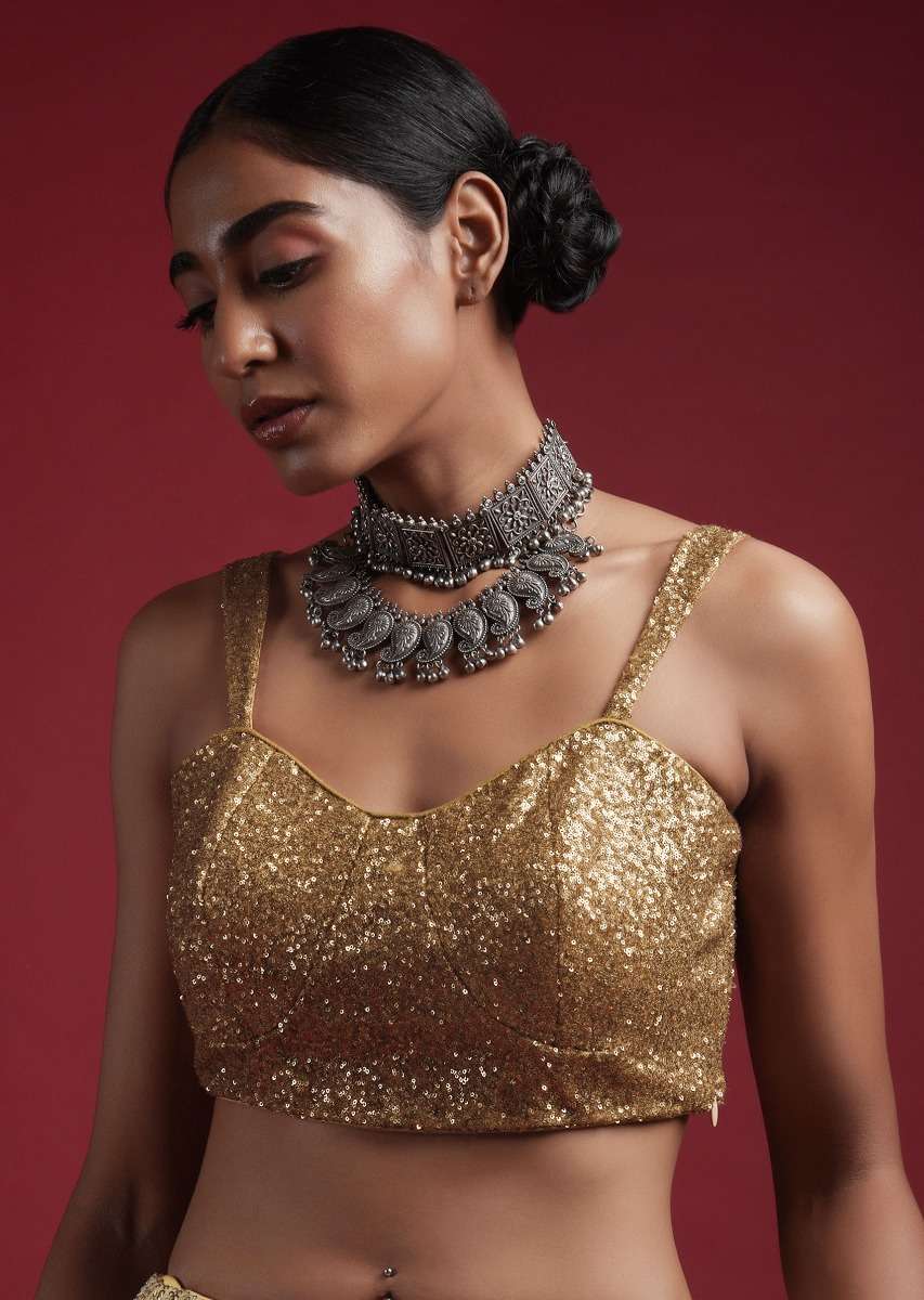 gold-blouse-in-sequins-fabric-with-tapering-straps-on-the-shoulders-and-corset-neckline-online_-kalki-fashion-m001bldy44y-sg57020_3__1_183d1638-b09c-4841-8b4d-80ba7821ba2f.jpg