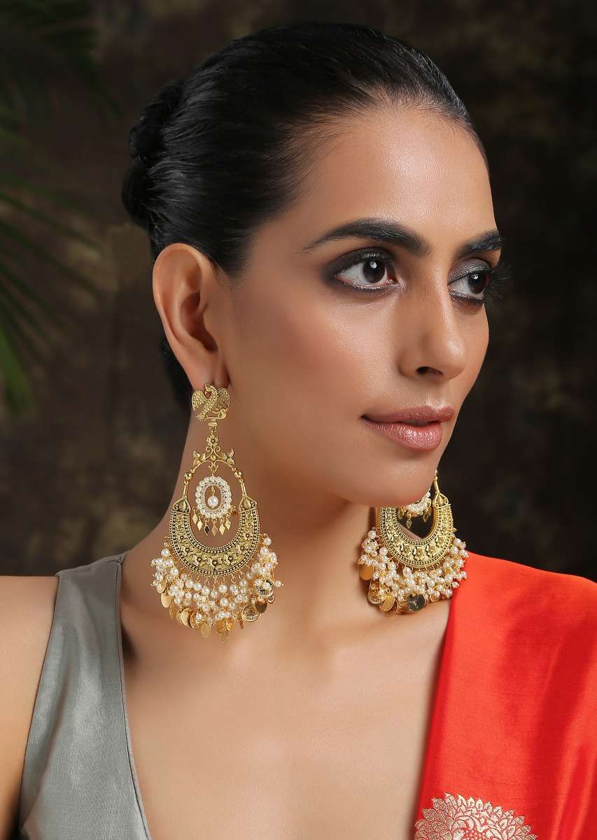 gold-chandbali-earrings-adorned-in-rich-shell-pearls-and-intricate-temple-detailing-by-paisley-pop-jk001ppsae70005y-sg65097_2__1_10ccca1b-88b6-4b8f-ac5a-d7986fa2be26.jpg