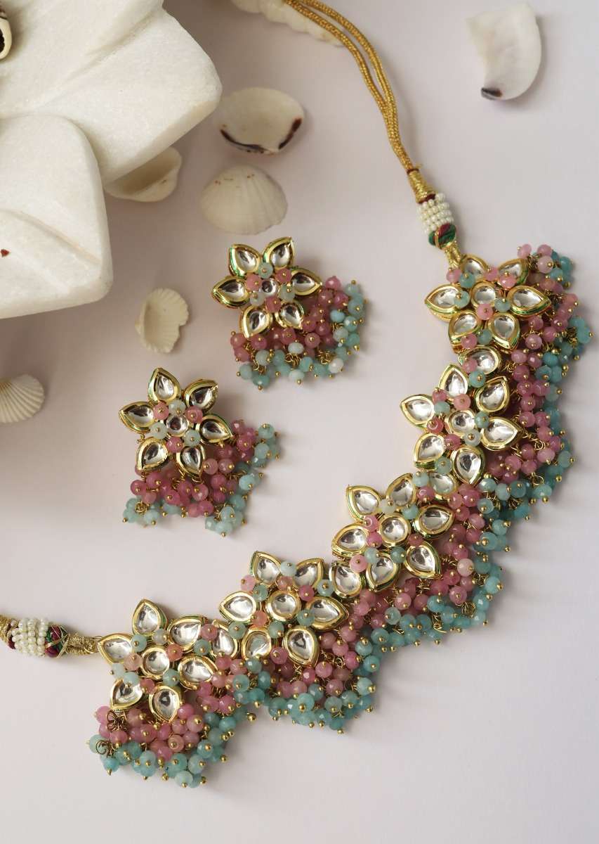 gold-plated-necklace-and-earrings-set-with-kundan-in-floral-motifs-along-with-dangling-pink-and-turquoise-beads-by-paisley-pop-jk001ppsan80028y-sg67062_7_04a9a74e-520e-43a0-b73a-db68e.jpg