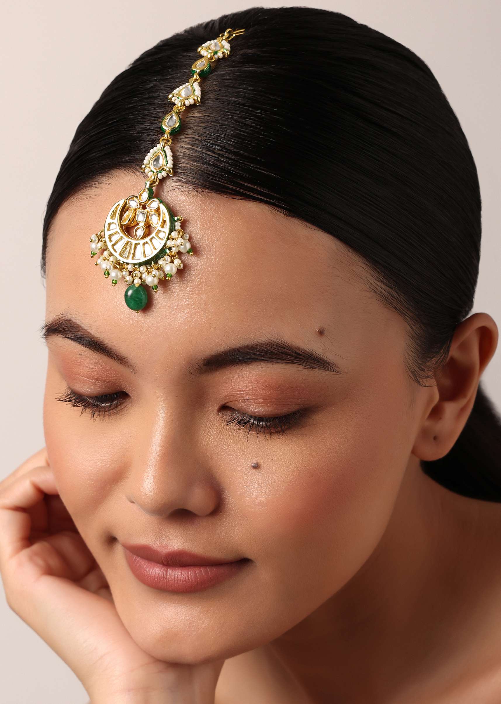 gold_finish_crescent_mangtikka_with_pearl_and_green_drops-sg196458_4_083a23e9-bf19-4f21-b2ba-f7313680fcaa.jpg