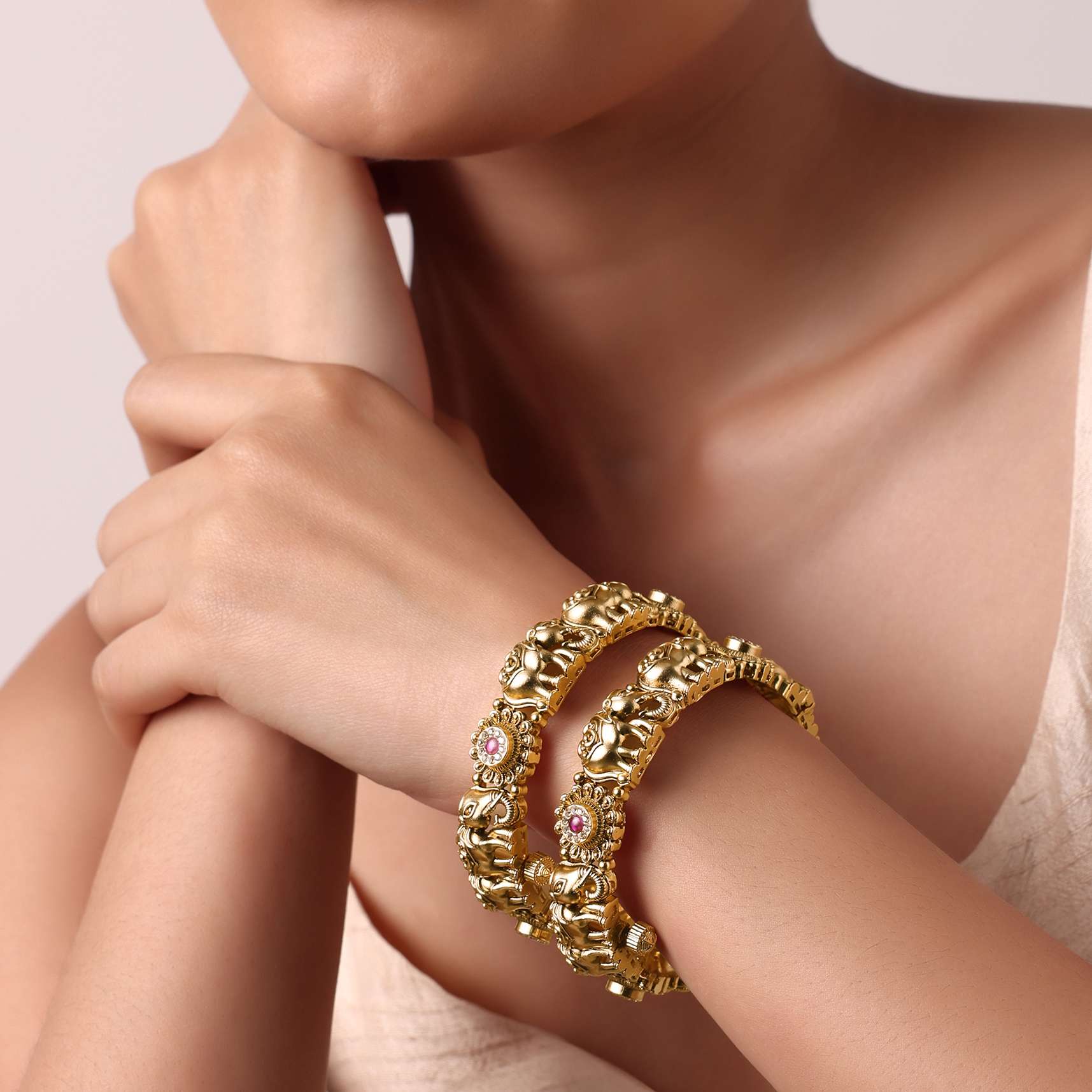 gold_kundan_temple_bangle_set_of_2_-sg213282_6_0cf18e71-6ff1-44be-96ad-caeb75c7d14e.jpg