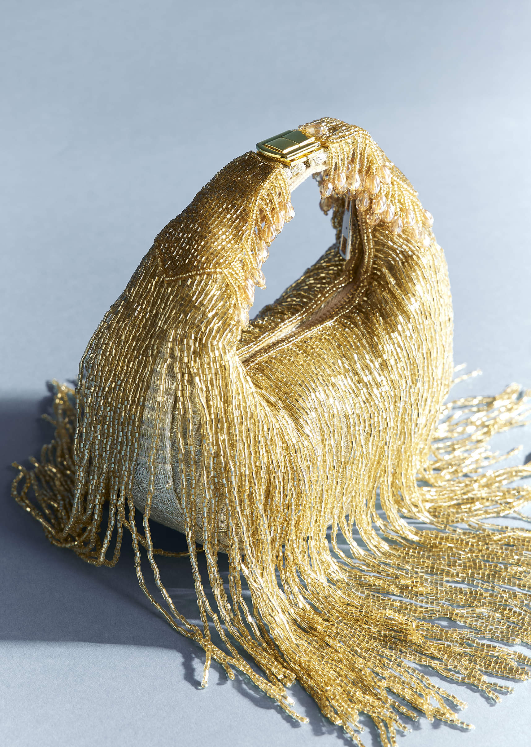 gold_potli_with_tassel-sg329670-1-nosto_2.jpg