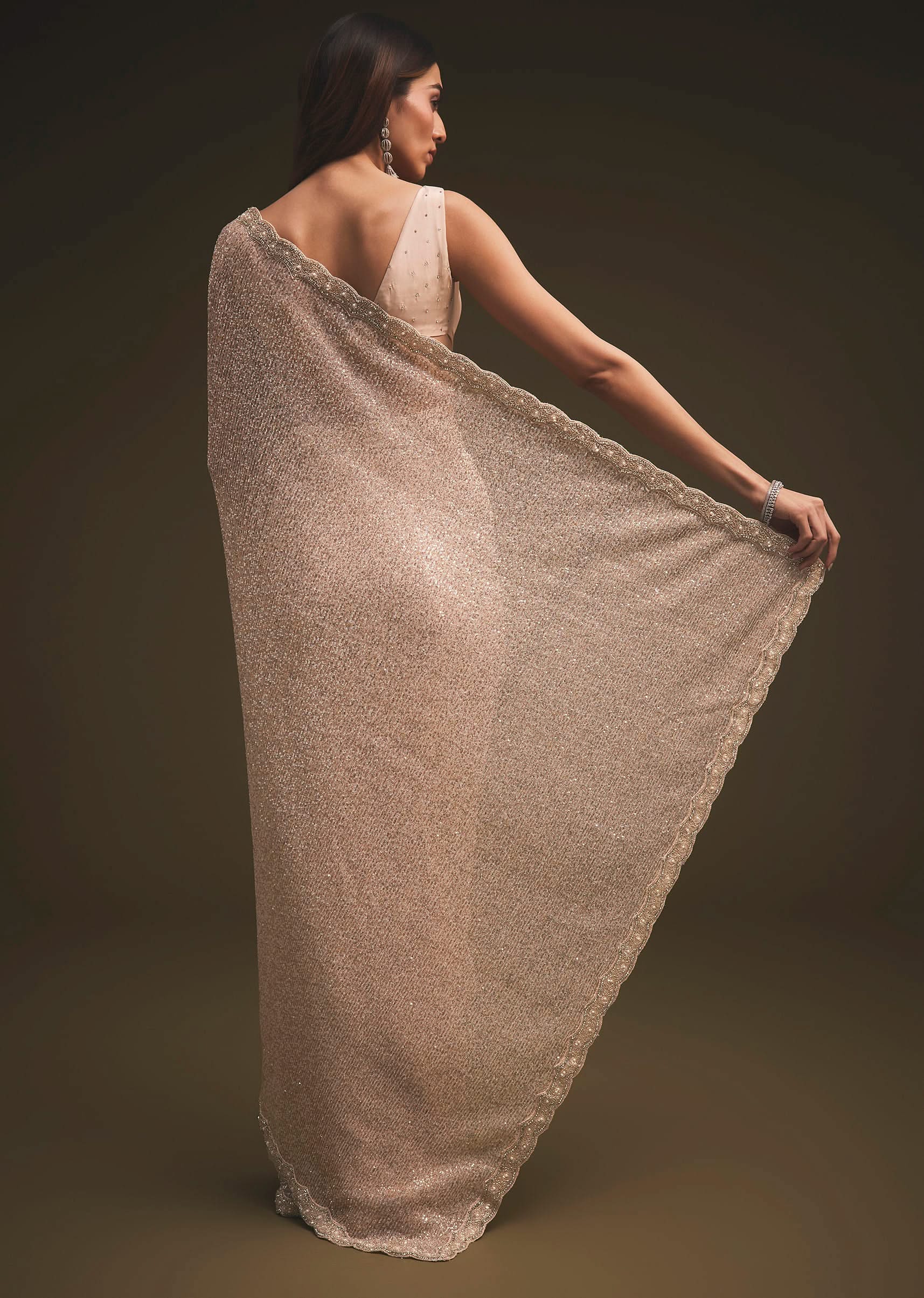 gold_sequins_saree_with_an_embellished_border-sg94825_11_85339c3b-d2ca-45f4-9351-9b9ee29f80a0.jpg