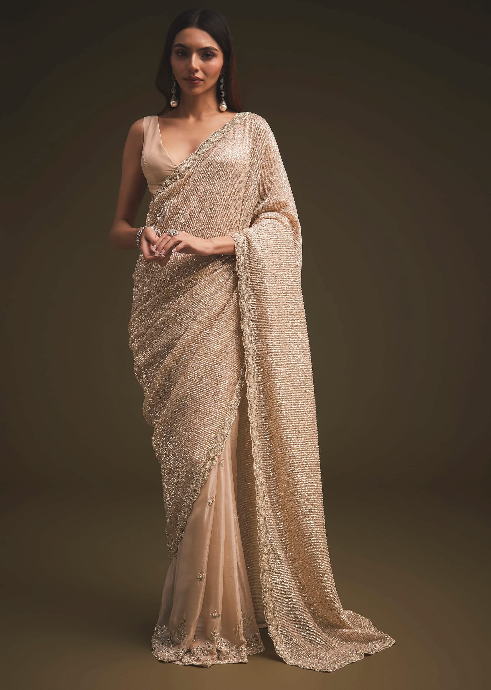 gold_sequins_saree_with_an_embellished_border-sg94825_15_56adad0a-ec8d-4f30-9951-f0668b70a405.jpg