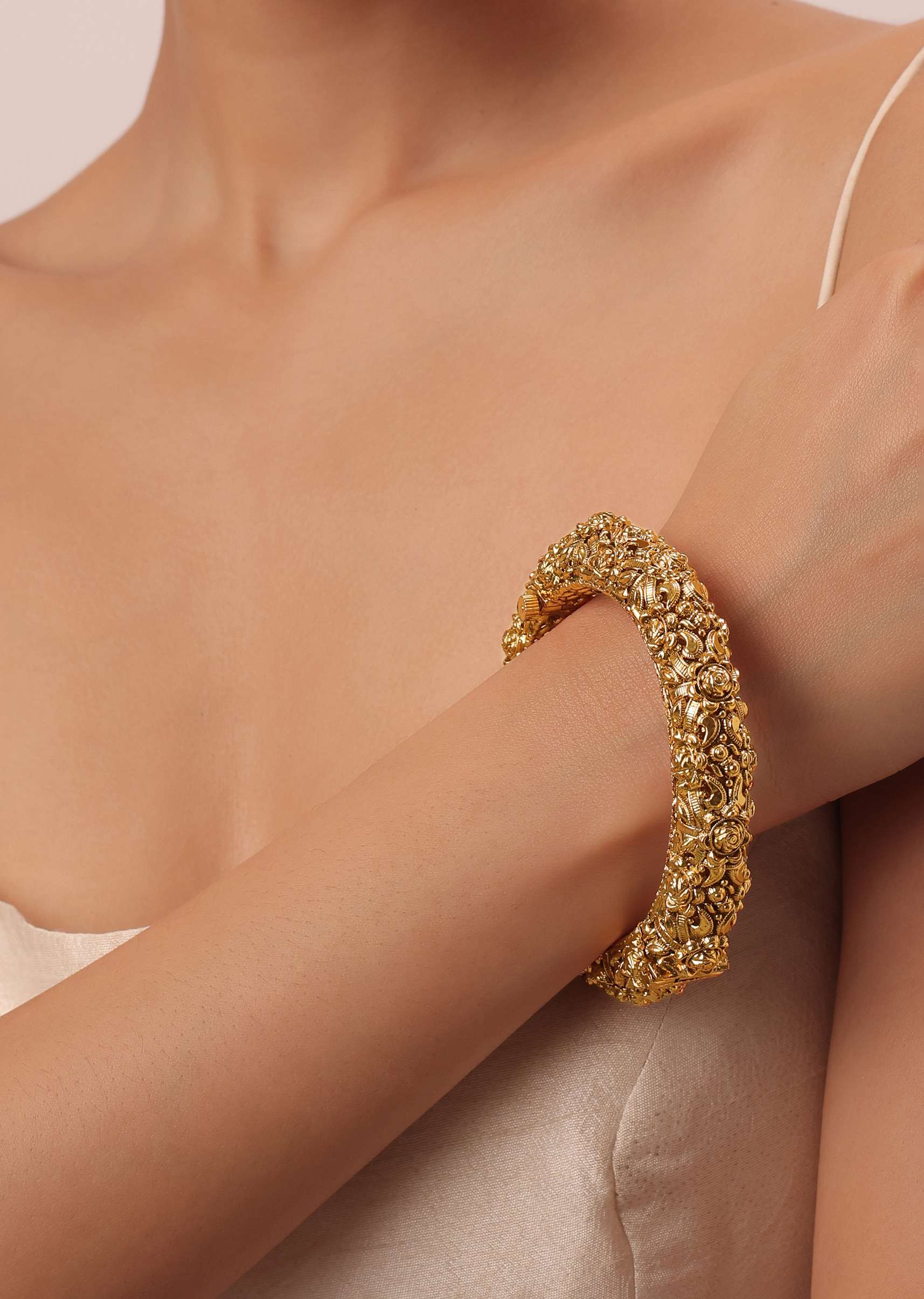 gold_tone_temple_bangle_with_carved_detail-sg202657_4_6762b87f-de20-4332-8285-834083ca3119.jpg