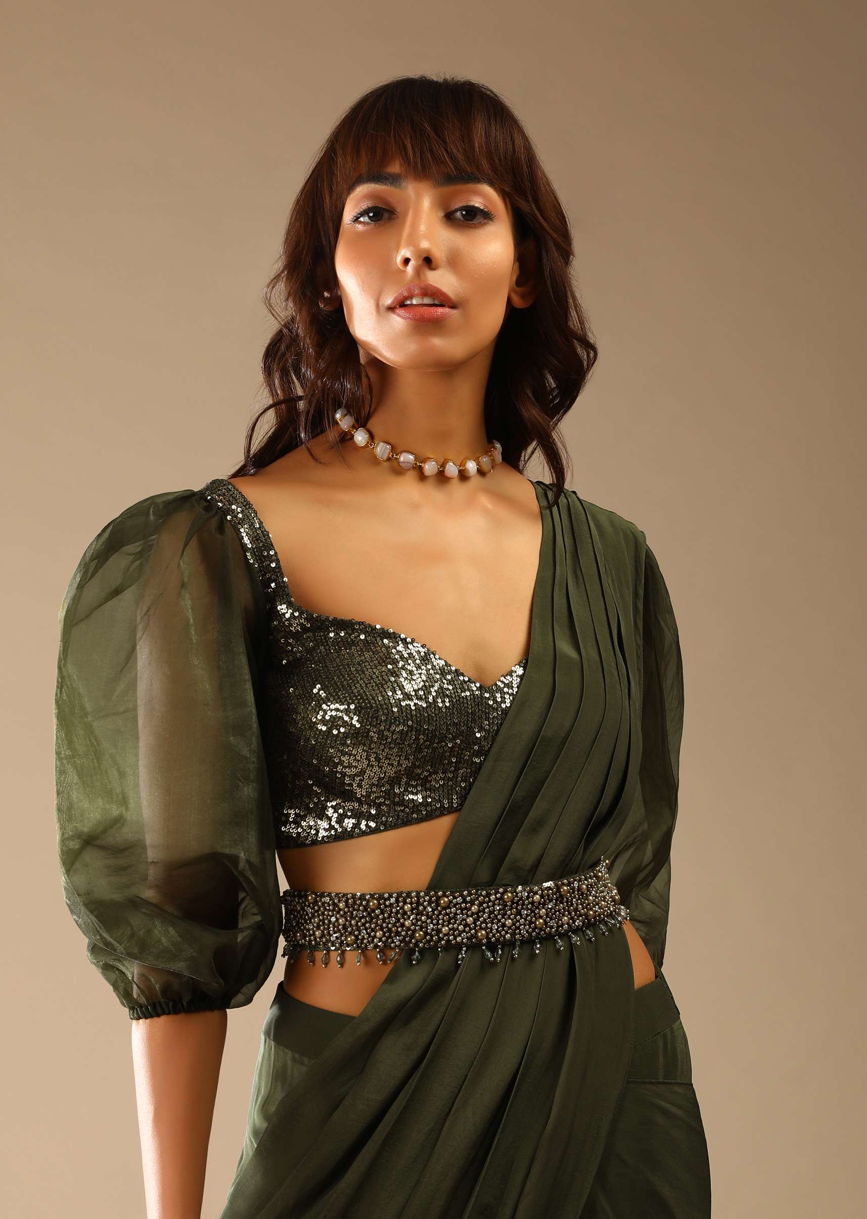henna-green-ready-pleated-saree-in-crepe-with-moti-embroidered-belt-and-balloon-sleeves-blouse-online-kalki-fashion-m001at371y-sg61661_6_9c578236-d749-4562-b6c5-04c9db1f5bfe.jpg