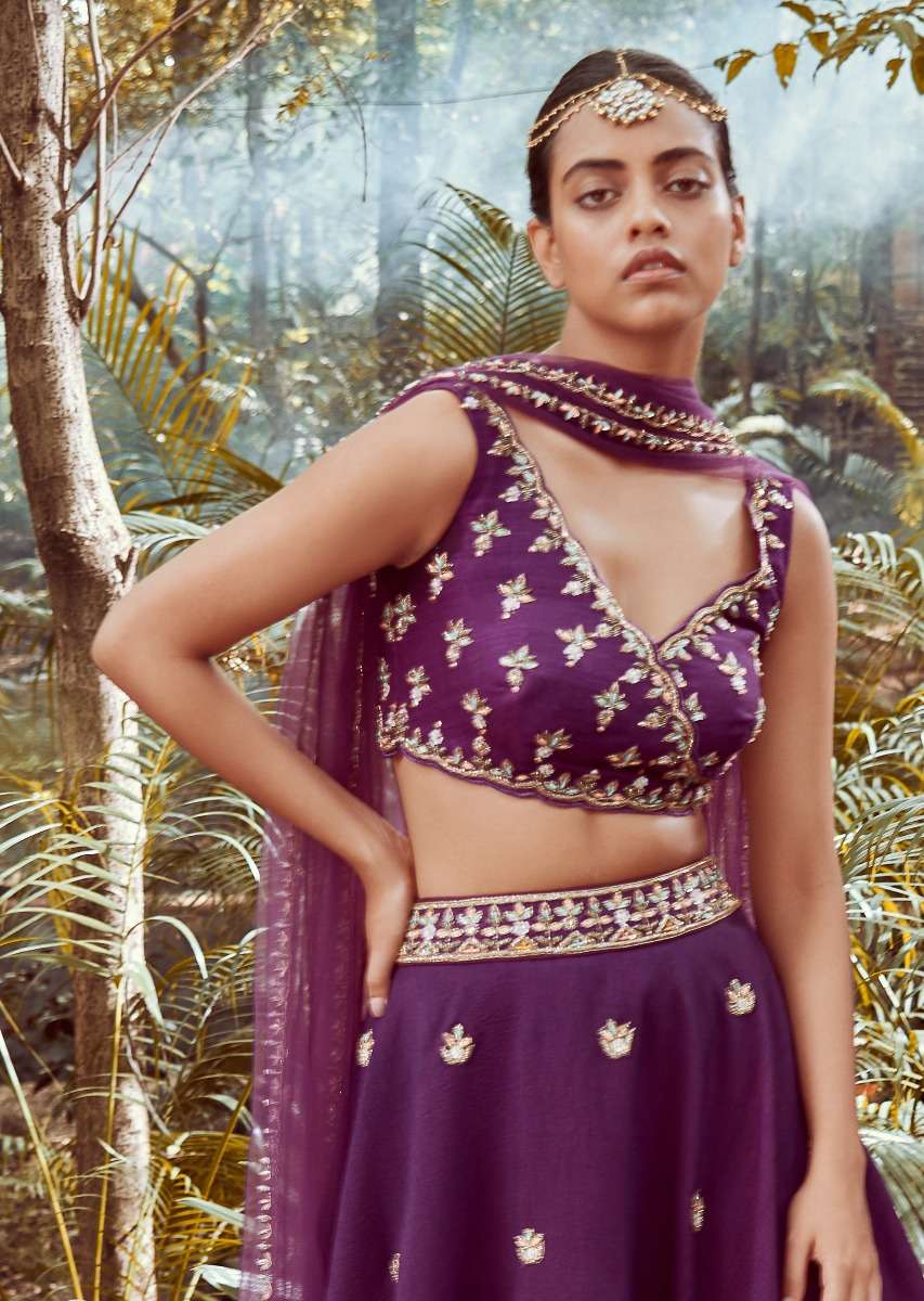 irish-purple-lehenga-choli-in-raw-silk-with-cut-dana-and-beads-embroidered-floral-buttis-and-overlapping-v-neckline-online-kalki-fashion-m001ra371y-sg52998_3_de0fa2ed-7d3b-47dd-bd80-d_ae3bbf5d-fba9-4db3-a51a-4284c10387e1.jpg