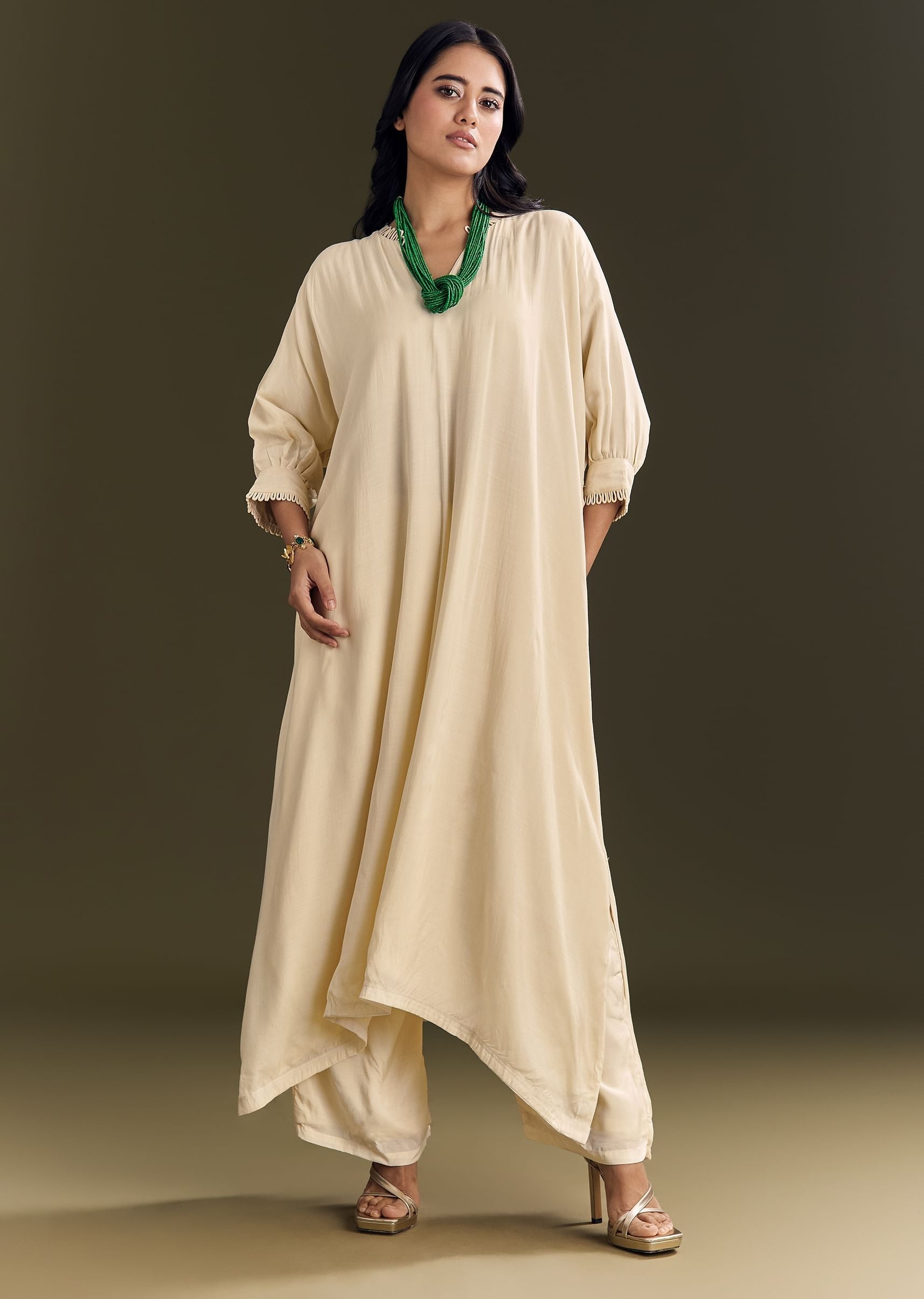 ivory-white-kurta-pant-set-with-green-beaded-neckpiece-sg312860-1_f414cfbd-8e71-4476-91ed-f52243866898.jpg
