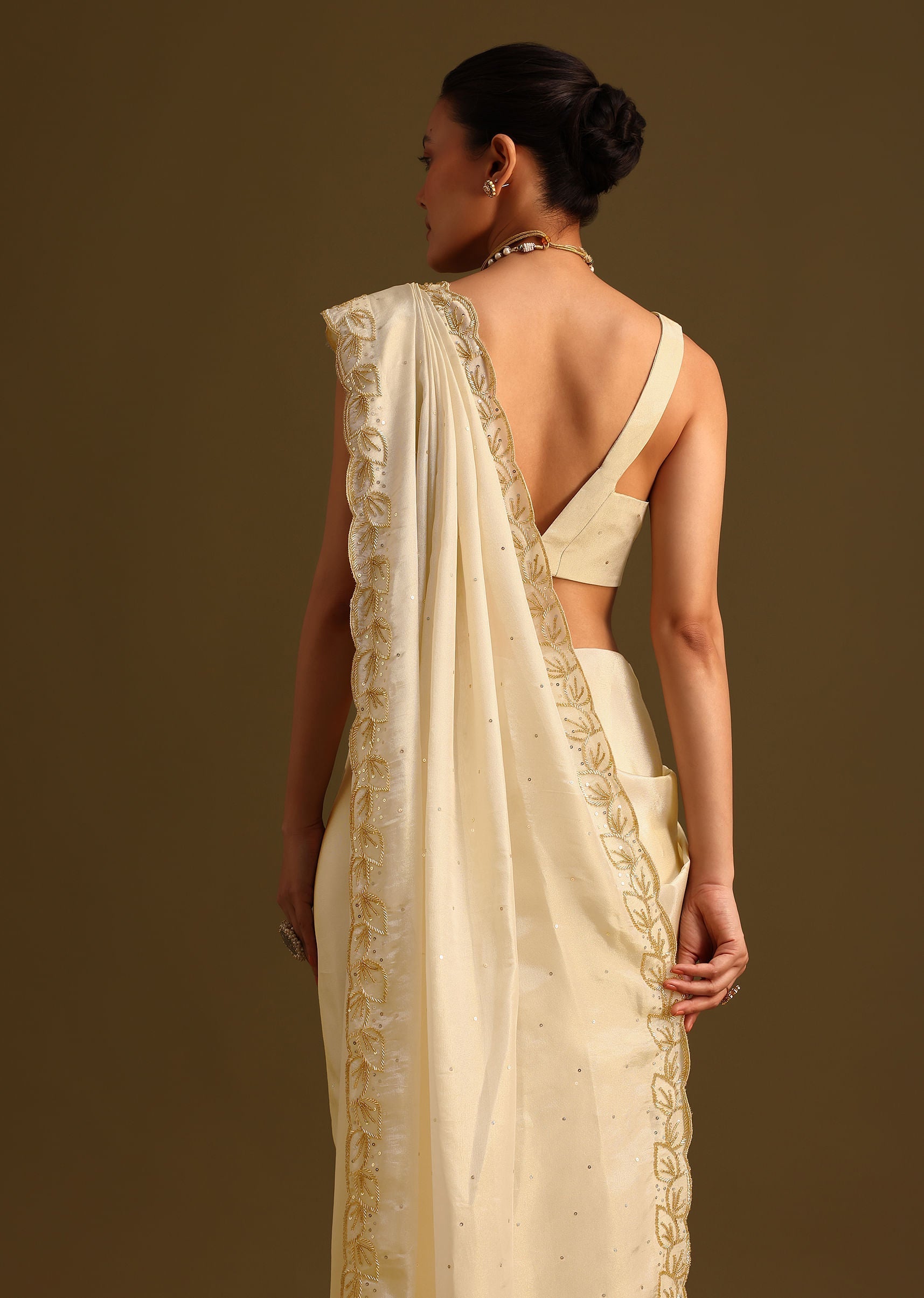 ivory_tissue_saree_with_cutdana_embroidered_border-sg245557_9_b64aa301-2ae7-484d-aba3-c2bafd5bba97.jpg
