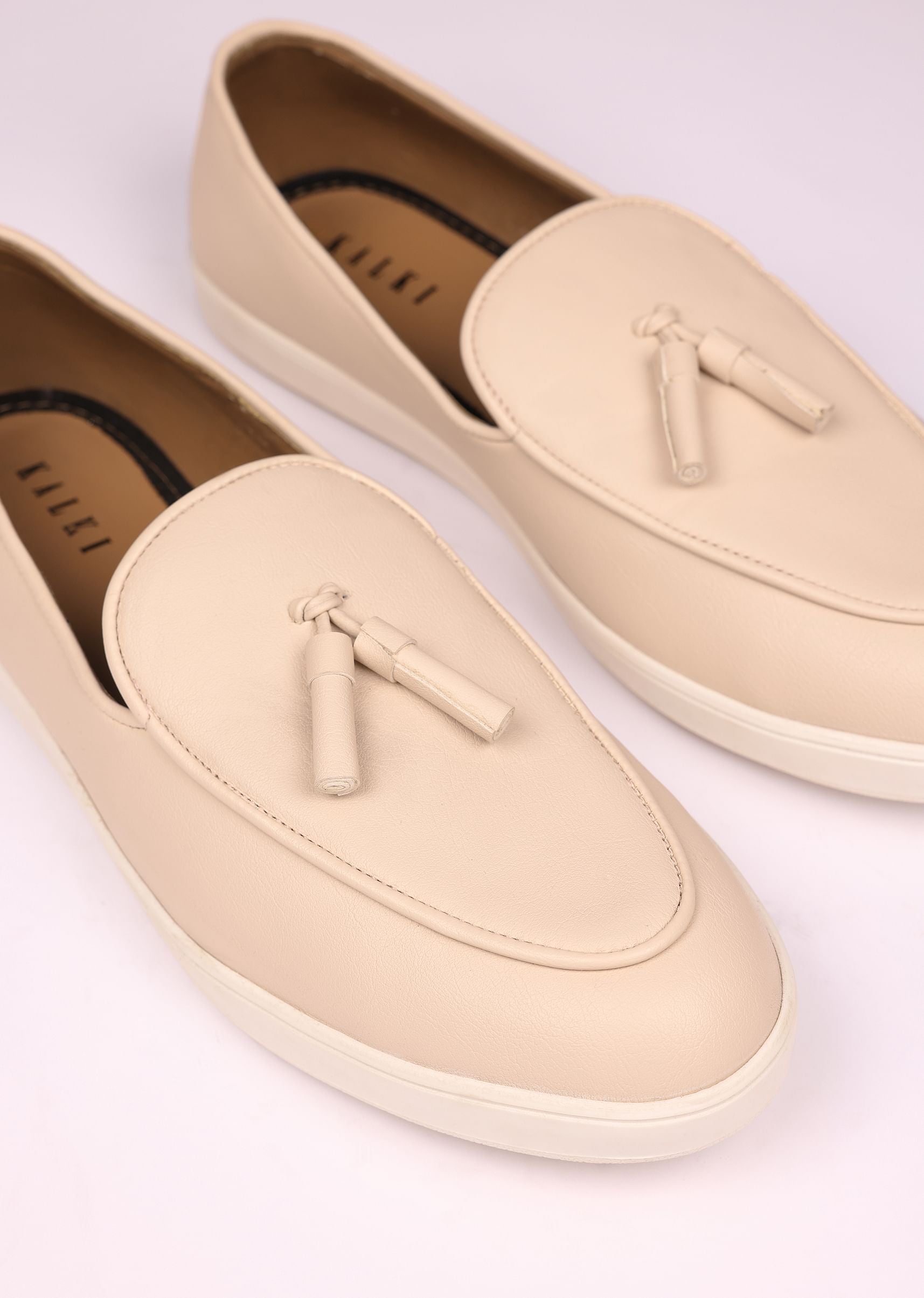 ivory_vegan_leather_tassel_jutti-sg222851_12_80a67a3d-000f-49b8-b41b-8ef5e95c9b22.jpg