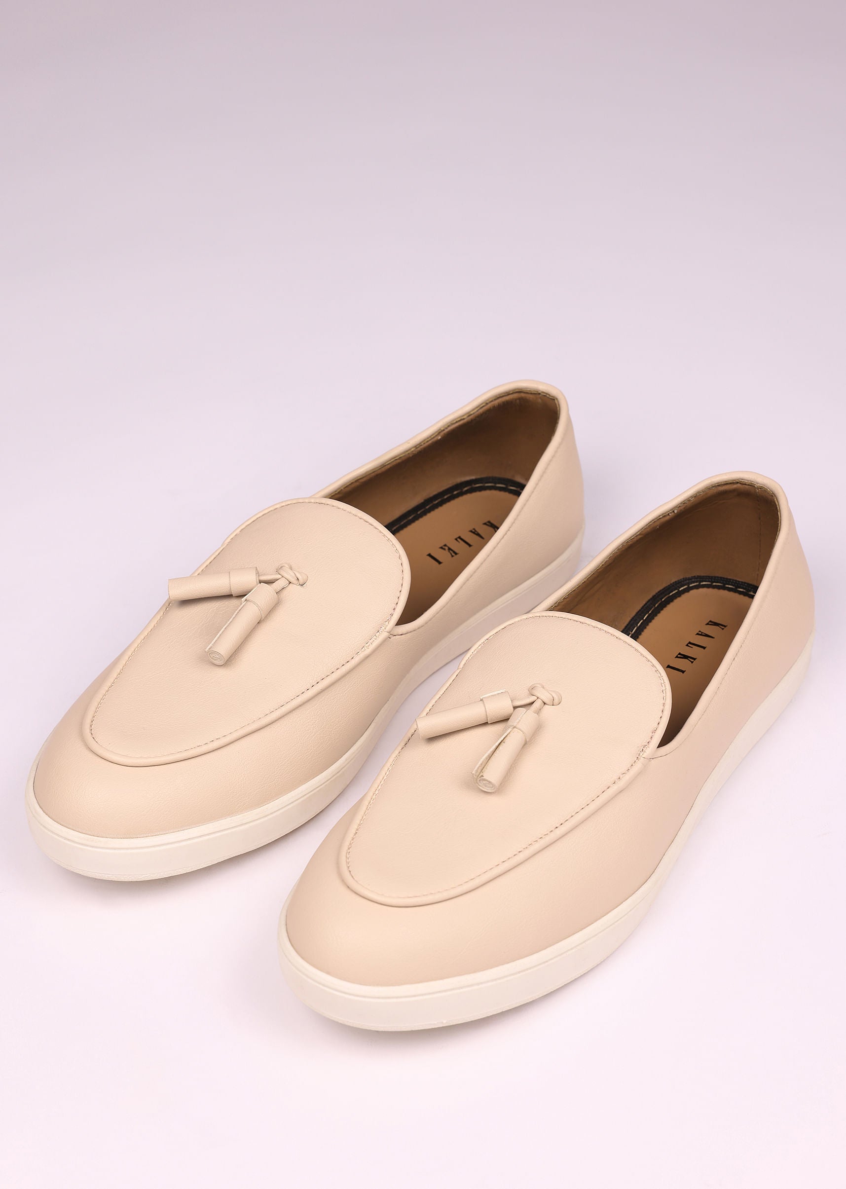 ivory_vegan_leather_tassel_jutti-sg222851_15_01b62656-a3fc-42f3-b33f-7d22b27ea102.jpg