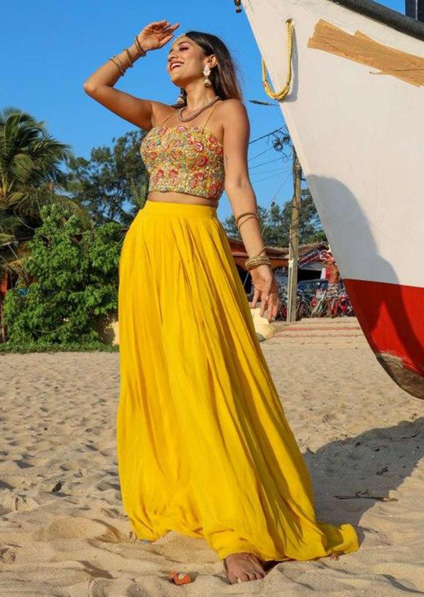 larissa_in_kalki_dustan_sun_mustard_palazzo_in_georgette_with_strapless_corset_and_embroidered_net_jacket_with_tassels_1_19993c1c-6fed-4840-b6d6-2a2c2a7f6edb.jpg