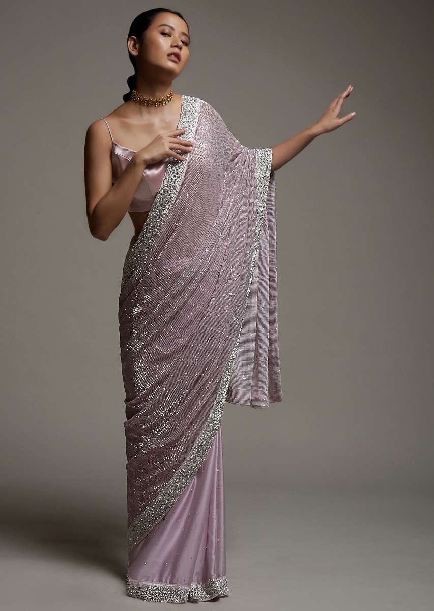 mauve_pink_half_and_half_saree_in_crepe_with_crushed_sequins_pallu_and_unstitched_blouse_online_-_kalki_fashion_3__1_dffb1826-0a3e-46d5-9d57-c4c0ba5f0f04.jpg