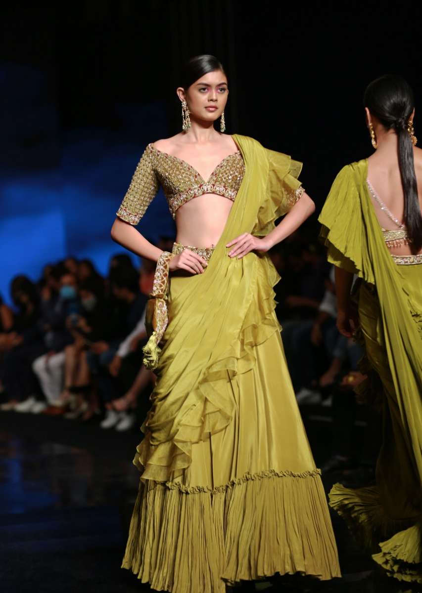 moss_green_lehenga_saree_in_crepe_with_frill_drape_-m001g3049y-sg81196_afa256cd-7084-455d-85c5-1319b5f3c20c.jpg