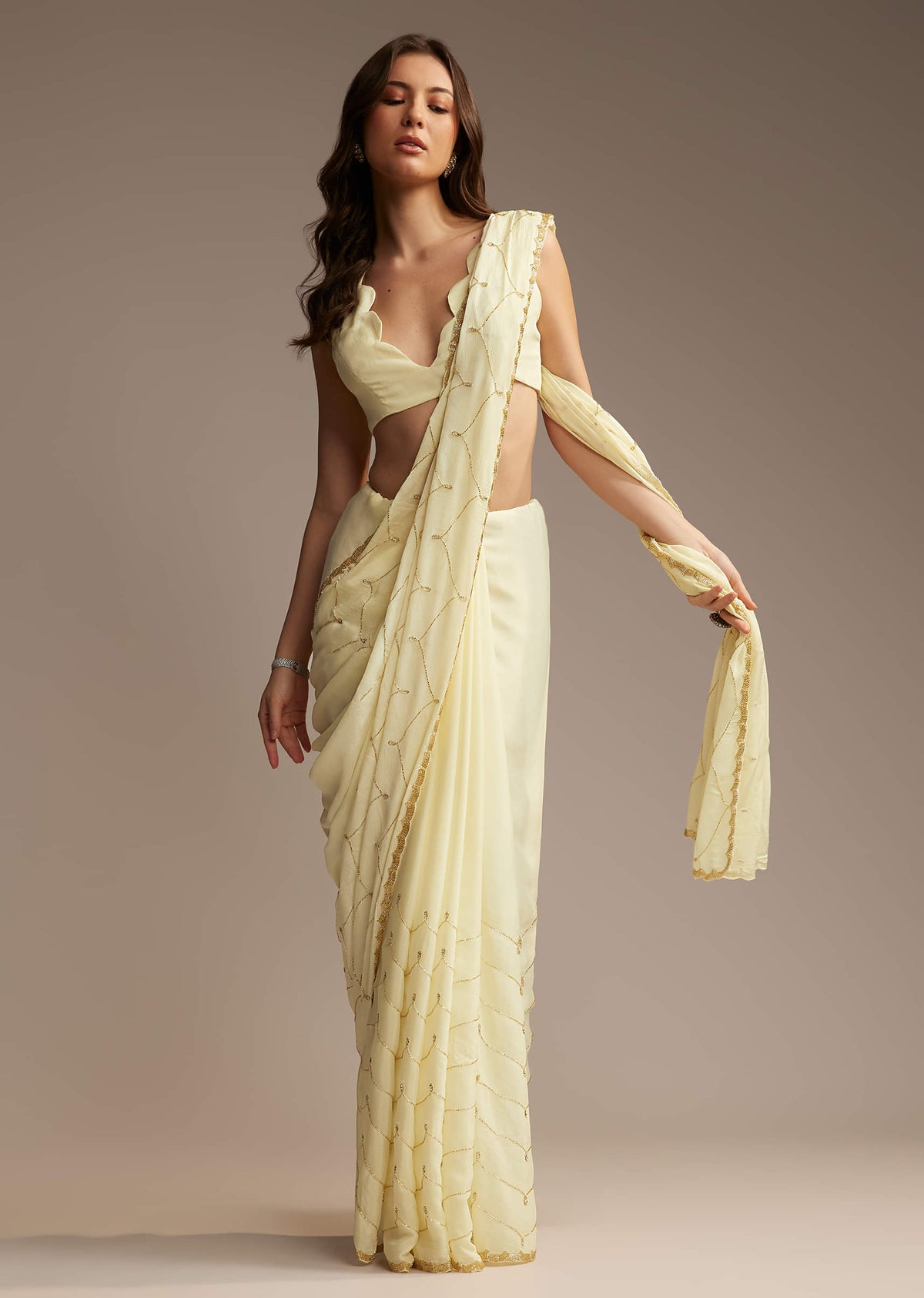 off-white-chinon-saree-with-cutdana-and-stone-work-sg317719-1.jpg