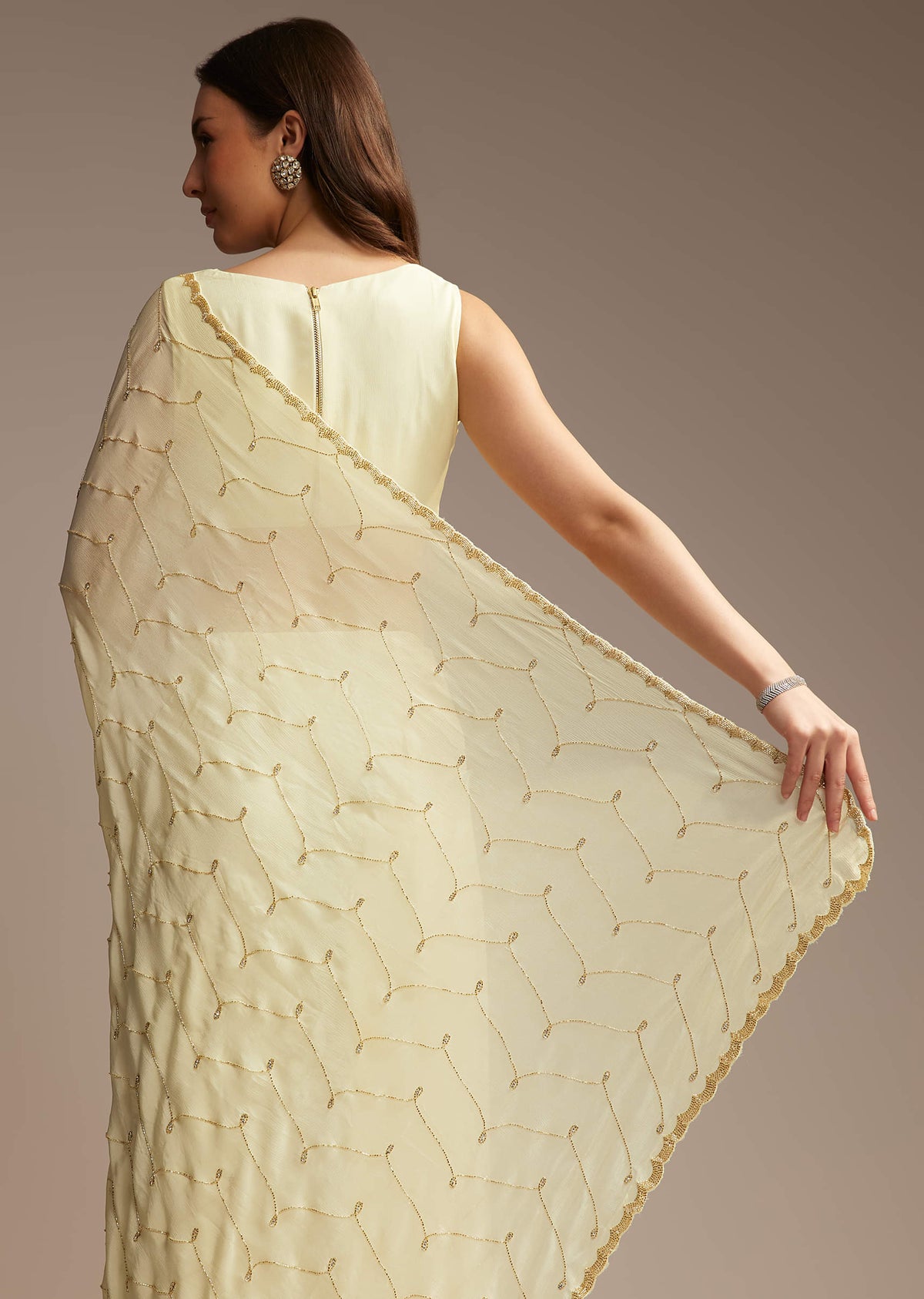 off-white-chinon-saree-with-cutdana-and-stone-work-sg317719-4.jpg