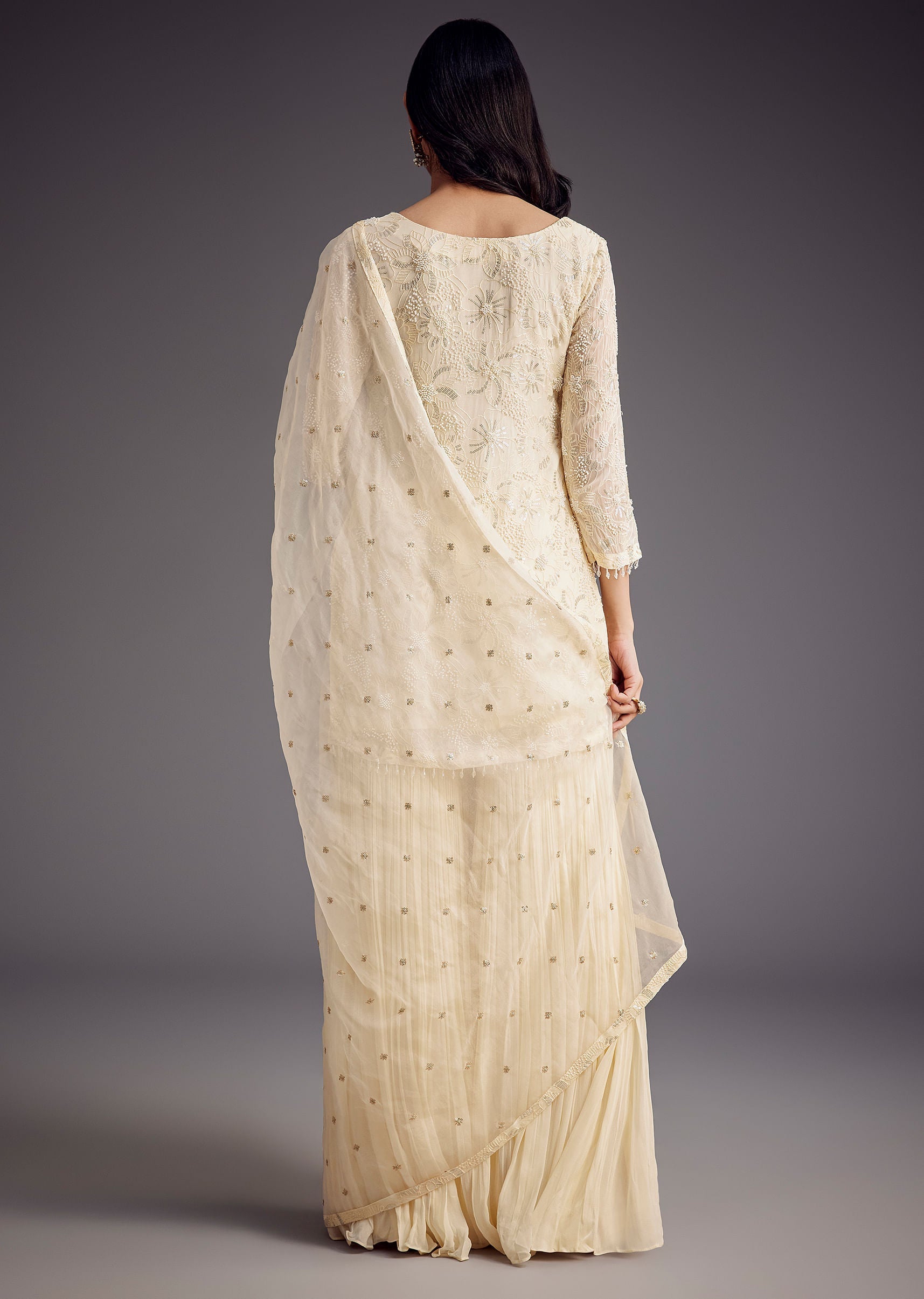 off_white_embroidered_sharara_set_with_organza_dupatta-sg285776_7_de811ab0-2612-49ff-ad76-0defbcaf8ebb.jpg