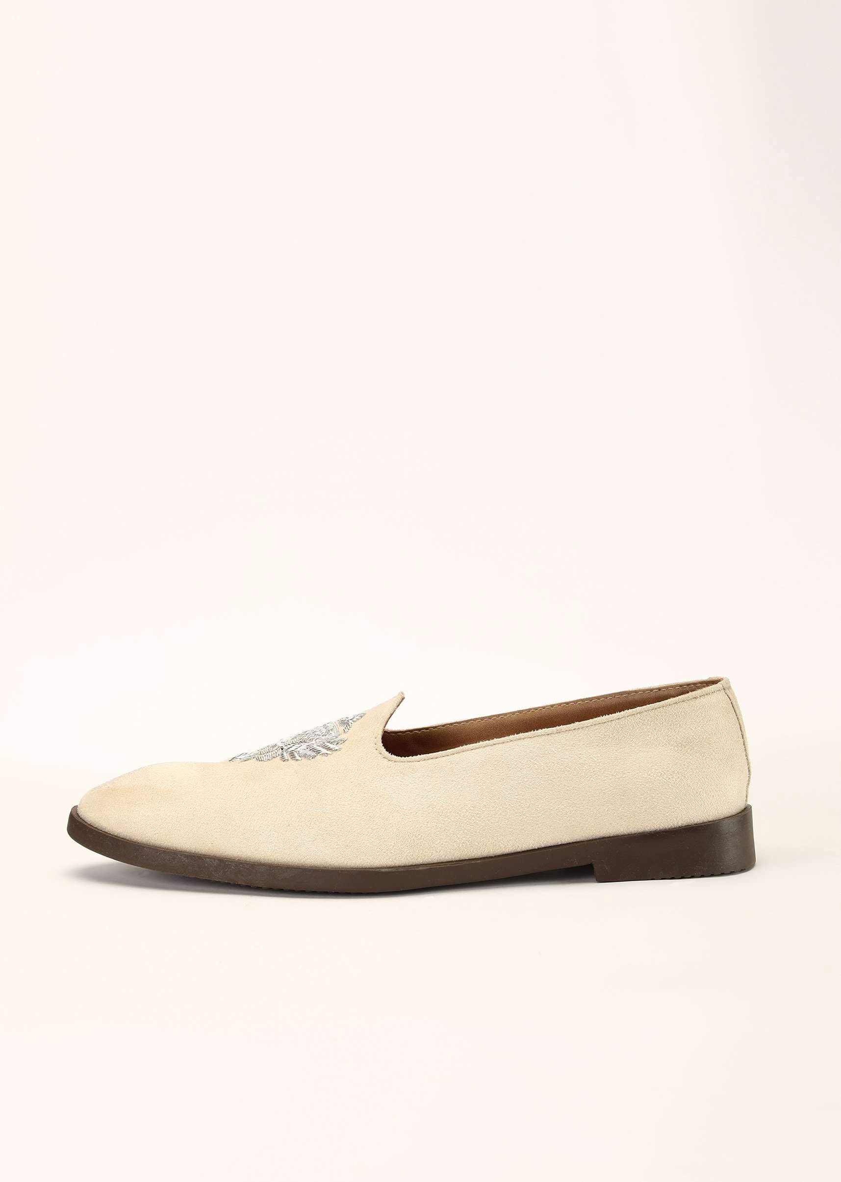 off_white_juttis_in_suede_with_zari_embroidered_motif-m150nms044hy-sg94501_4_69d03b80-77b1-4f21-8128-b2d0210abd2c.jpg