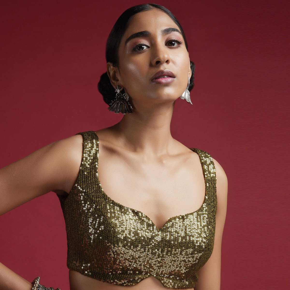 olive-green-sleeveless-blouse-in-sequins-fabric-with-notched-neckline-online_-kalki-fashion-m001bldy52y-sg57037_1__1_1ec7ba51-7060-46cc-a517-d6225f26f215.jpg