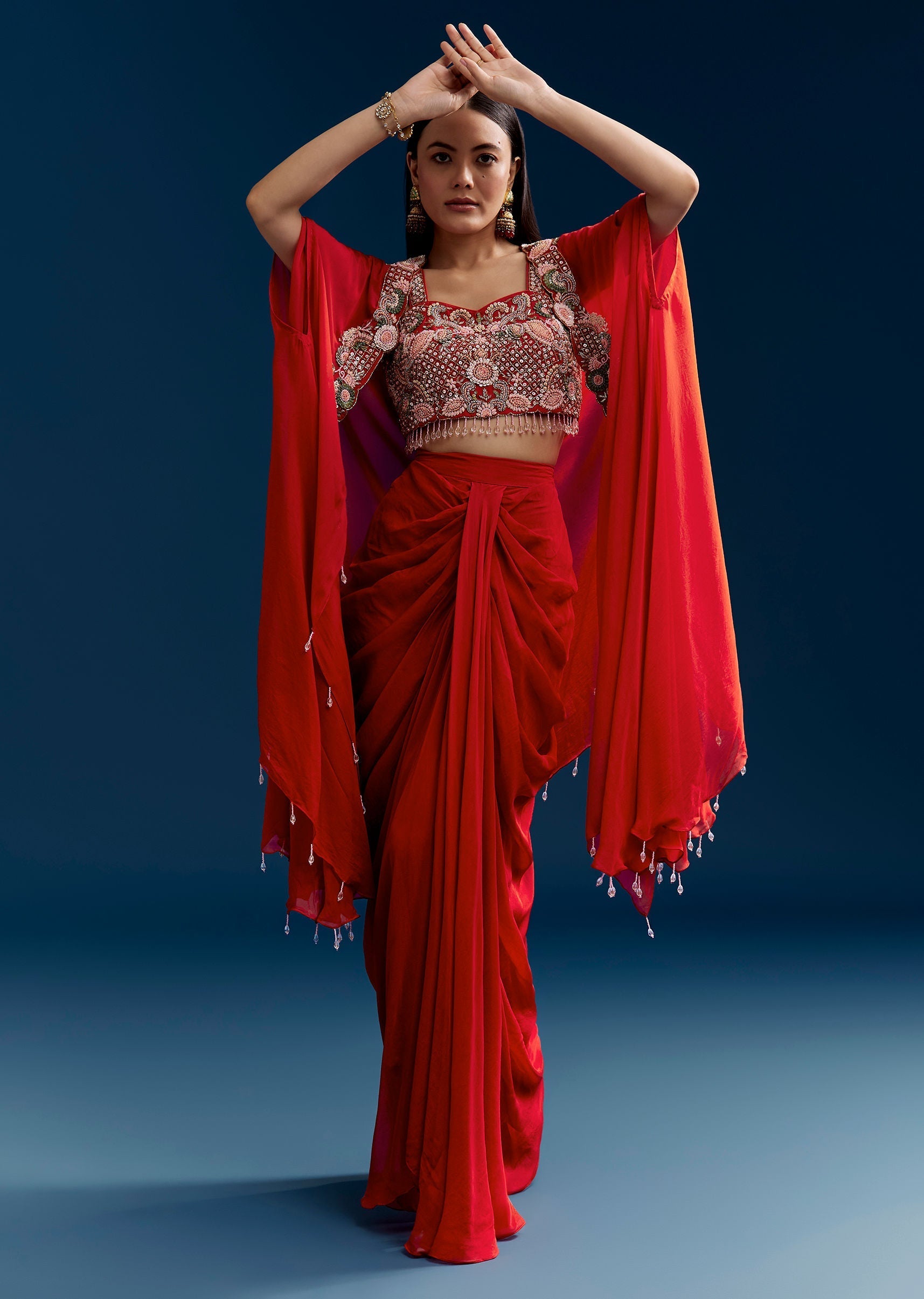 orange-crop-top-skirt-set-with-embroidered-cape-sg329718-3_48c25e34-de73-458e-939f-91866d059fa0.jpg