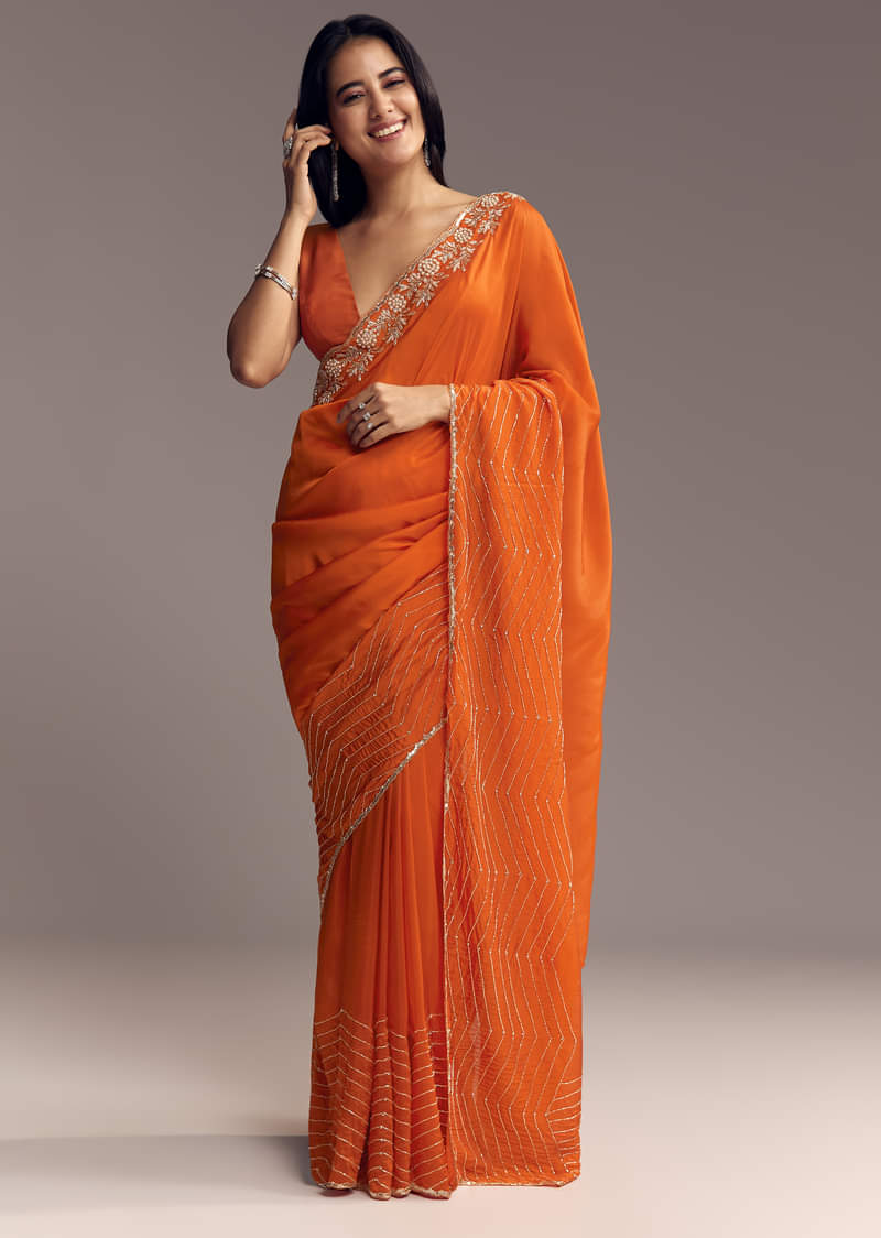 orange-organza-saree-with-zigzag-sequins-and-cut-dana-embroidery-sg317724-1_1d6f655f-e8fd-4f81-b4c3-16b65d4ba842.jpg