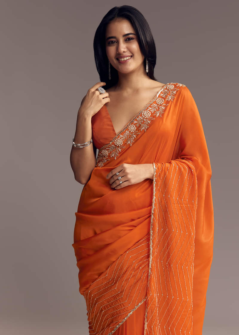 orange-organza-saree-with-zigzag-sequins-and-cut-dana-embroidery-sg317724-5_13bdefff-524e-4dbc-abc5-6149c45dac59.jpg