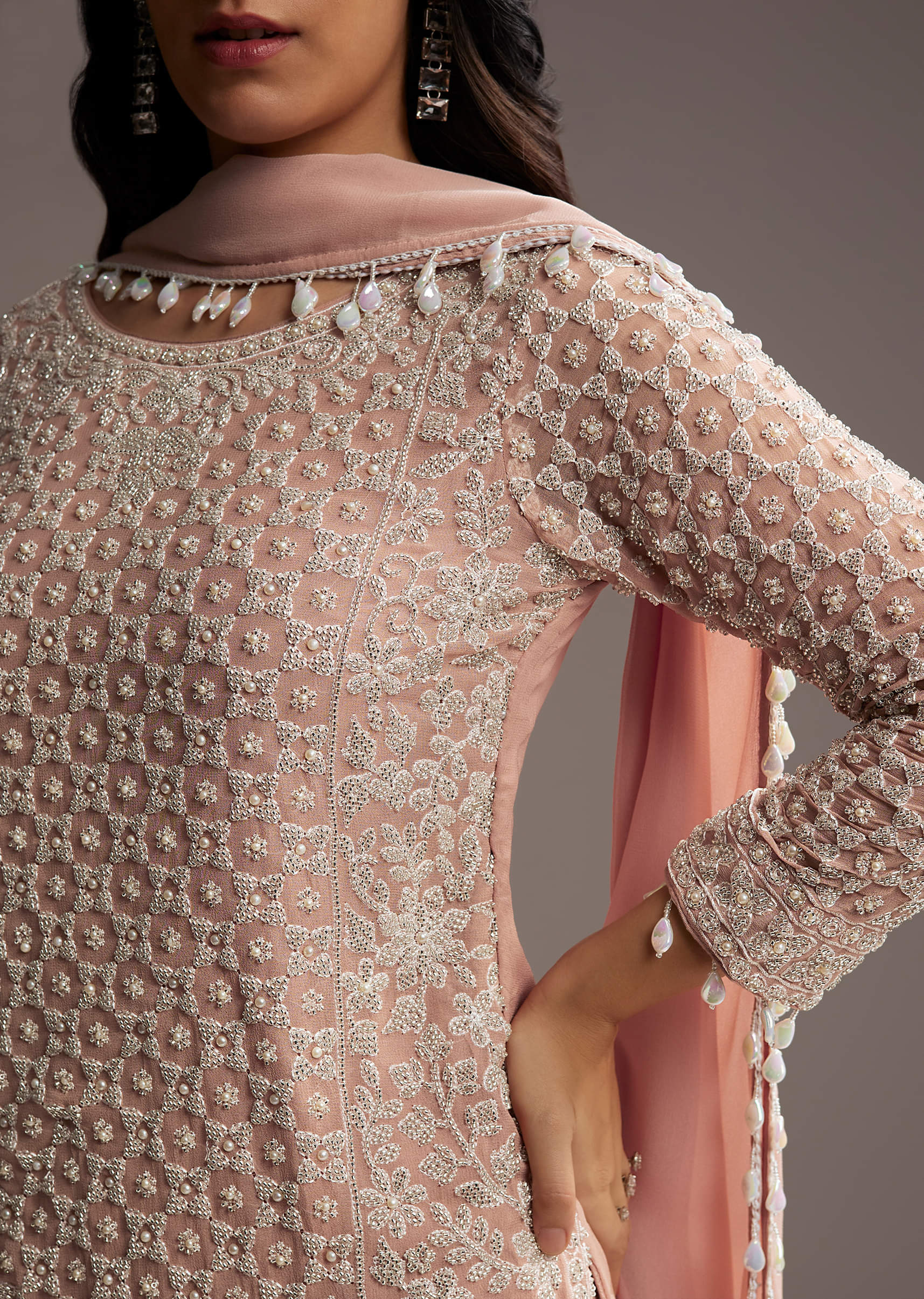 pastel-peach-georgette-kurta-set-with-beads-work-sg326282-1.jpg