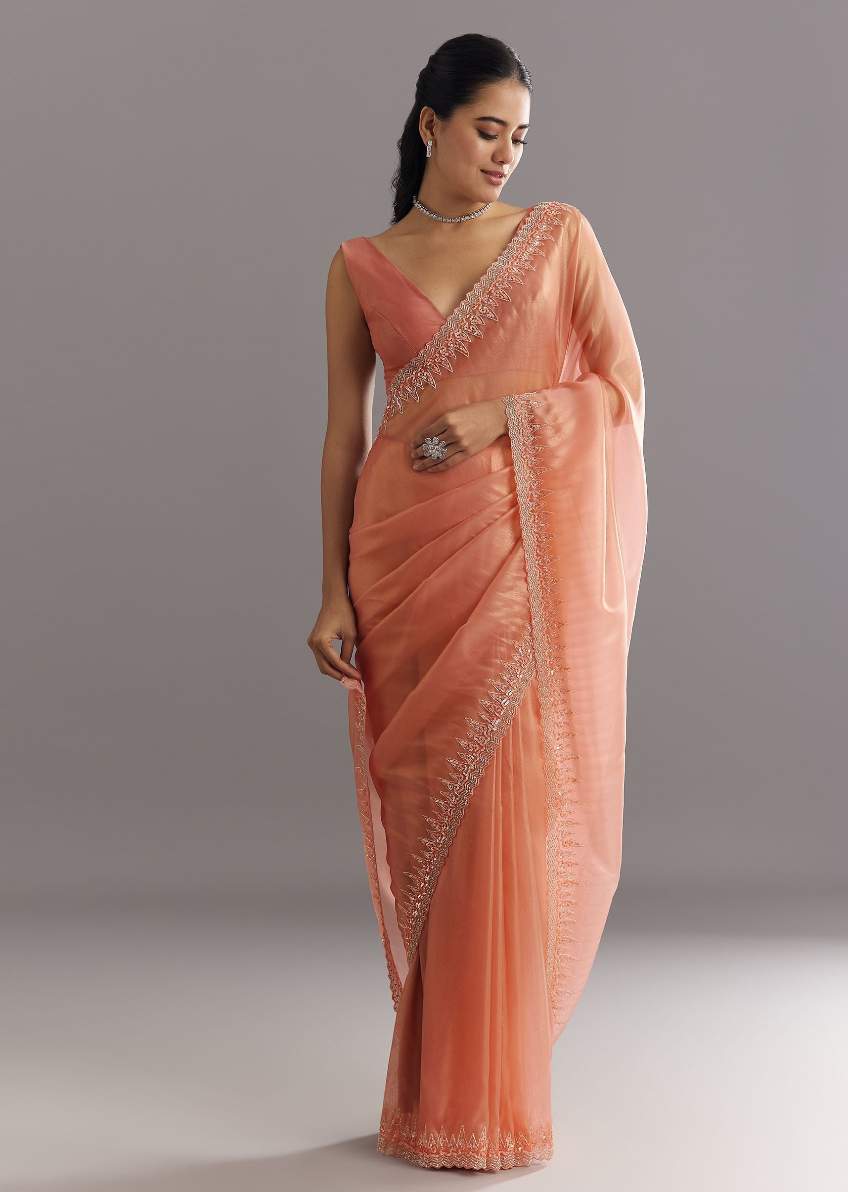peach-glass-tissue-saree-with-cutdana-sequins-embroidery-and-cutwork-scallop-border-sg292882-1_77db3322-b50f-4a81-ad00-241988434e18.jpg