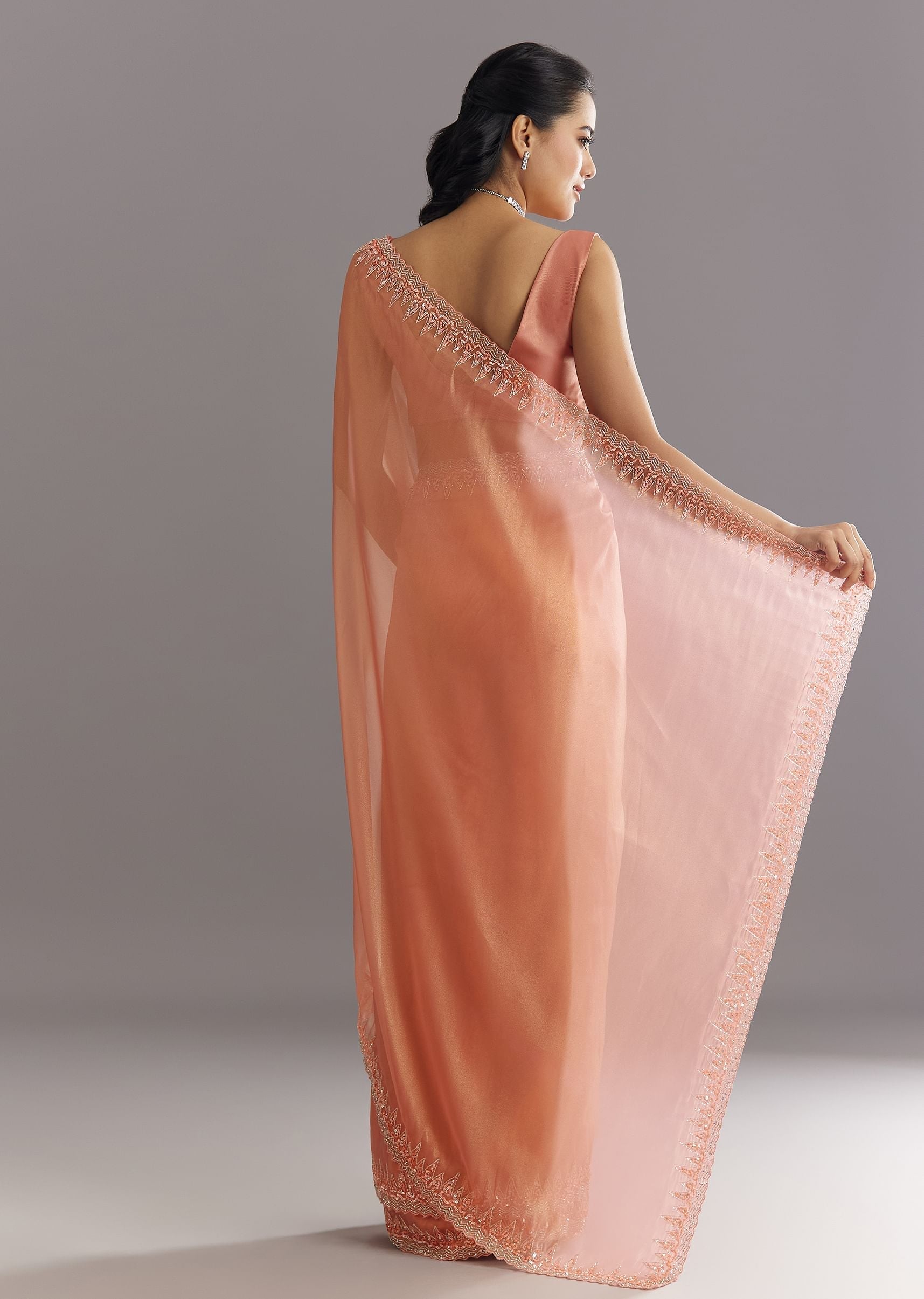 peach-glass-tissue-saree-with-cutdana-sequins-embroidery-and-cutwork-scallop-border-sg292882-6_2a0cf304-f08d-4cd2-8a47-147ff8c98a8b.jpg