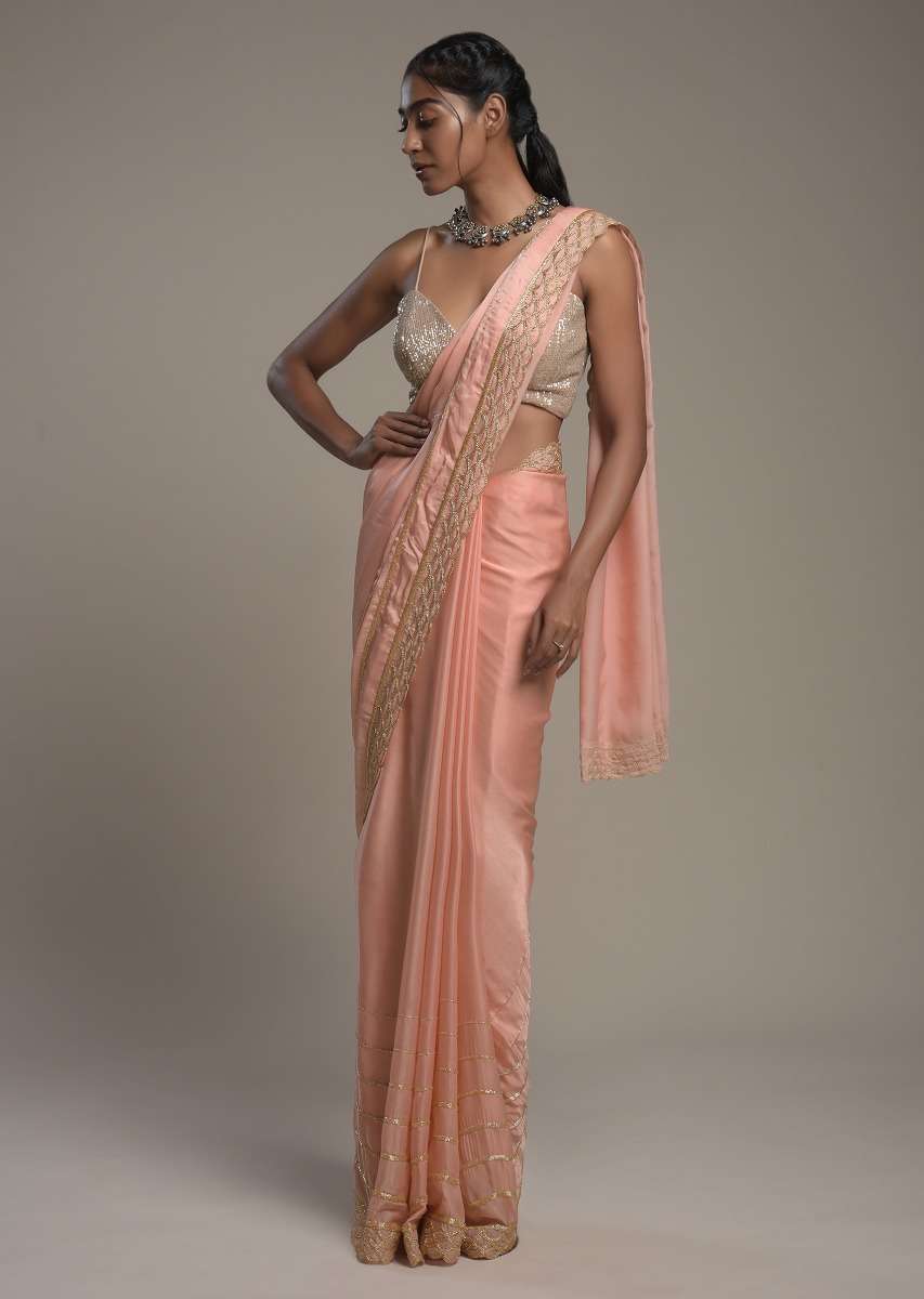 peach-saree-in-satin-with-cut-dana-and-zardosi-embroidered-stripes-and-unstitched-blouse-online-kalki-fashion-k002srhs1090y-sg53445_7_411d3692-b7b1-48ac-a7c8-9dc8498f822f.jpg