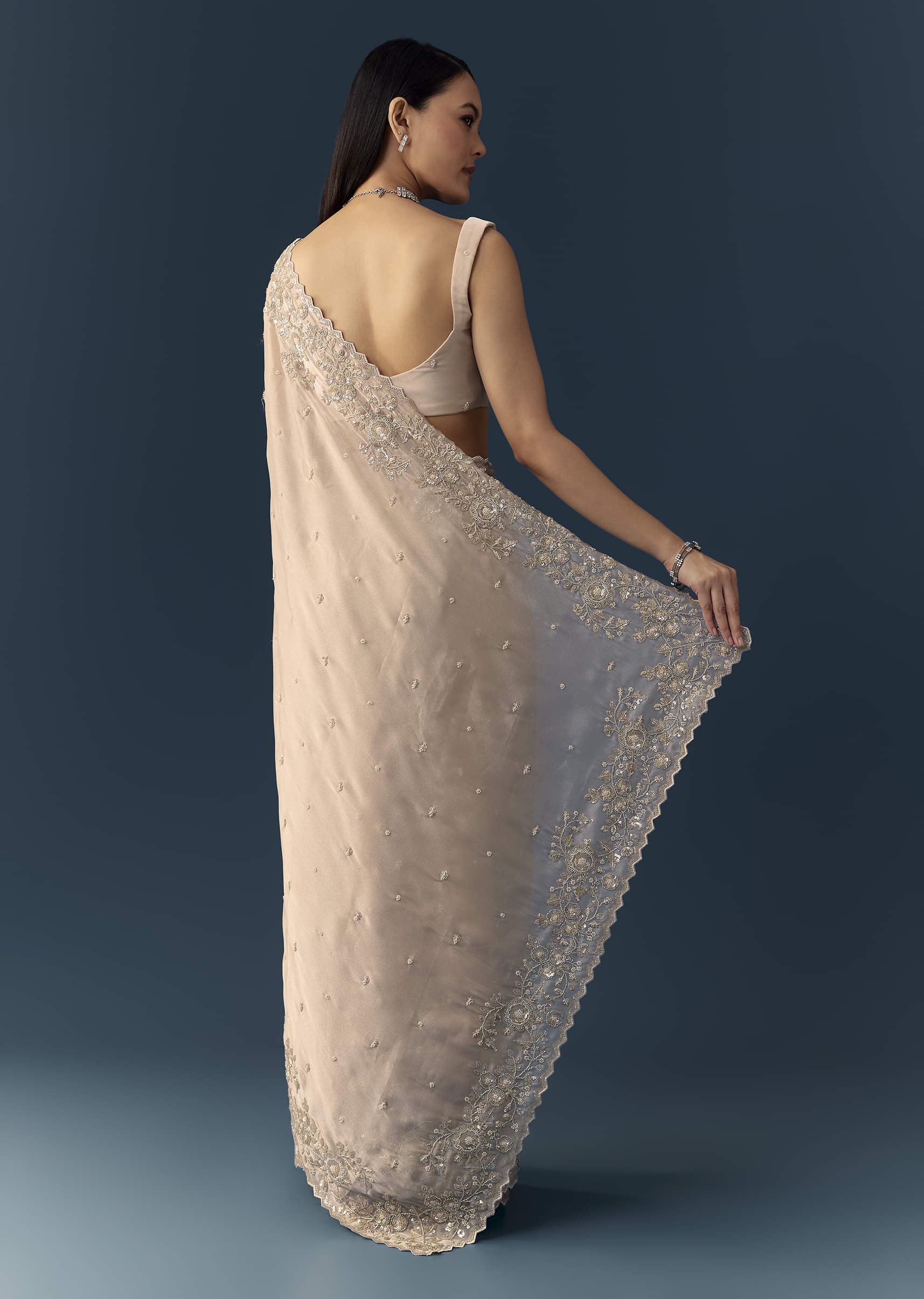 peach-tissue-organza-cutwork-saree-with-unstitched-blouse-fabric-sg345840-4.jpg