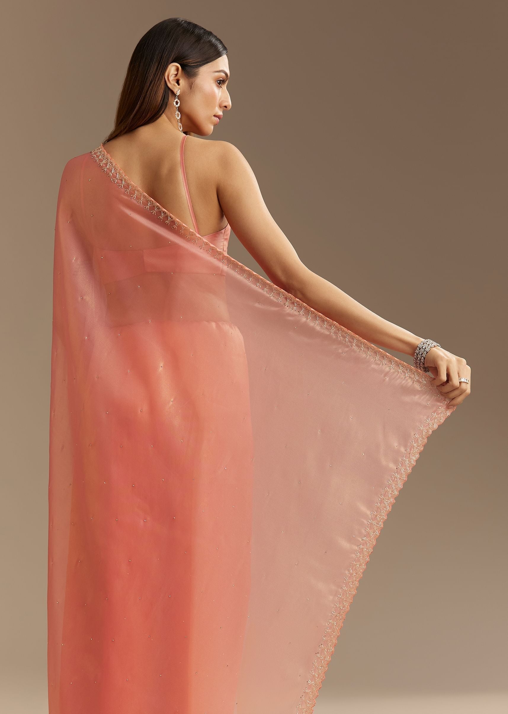 peach-tissue-saree-with-stones-cutdana-embellishments-and-scallop-border-sg294557-5_2f725352-70d3-4155-9c91-b99a55e48bfc.jpg