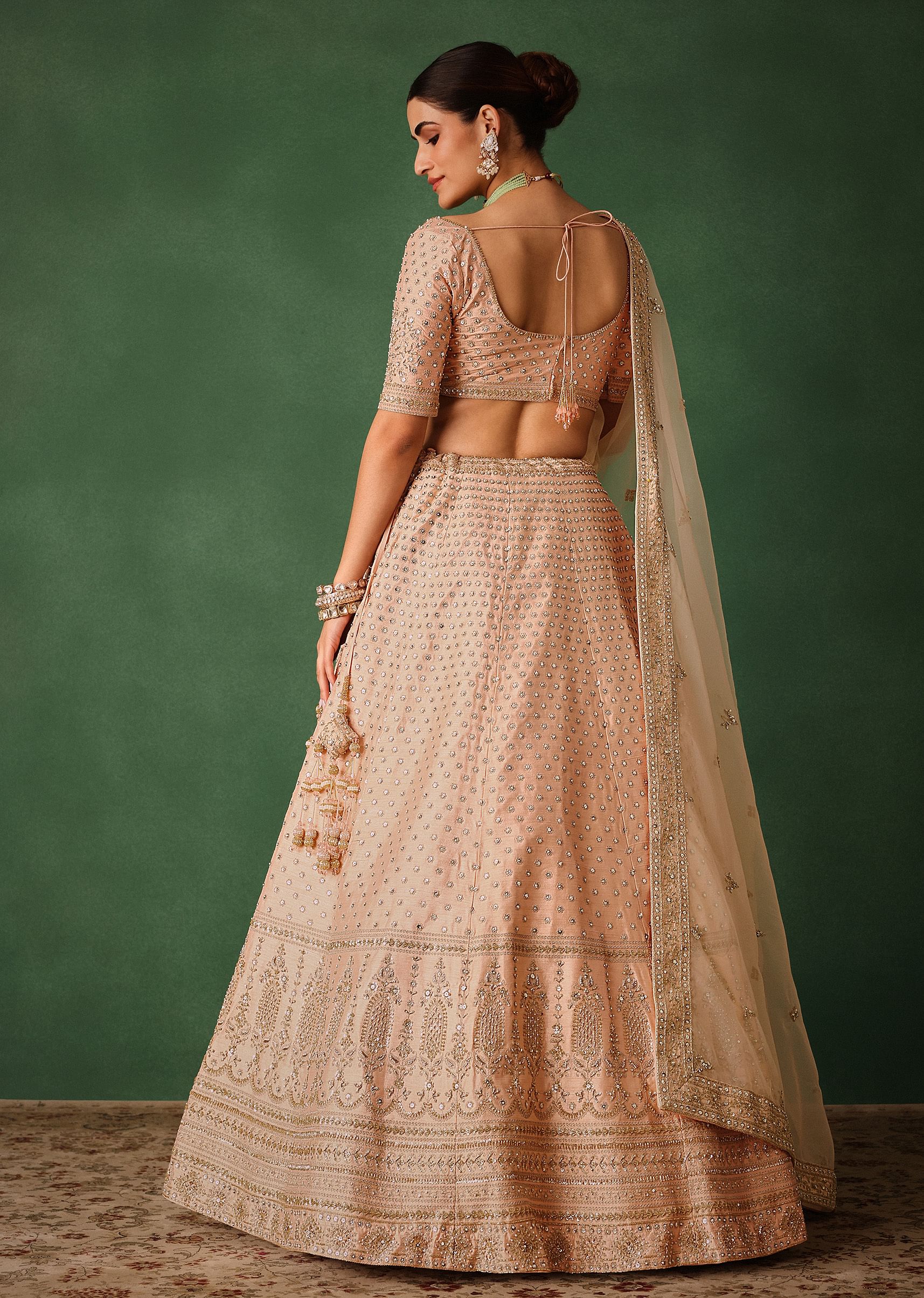 peach_raw_silk_lehenga_set_with_hand_embroidery-sg231206_4_7e51898e-ccd9-409a-b92f-509d94ed563a.jpg