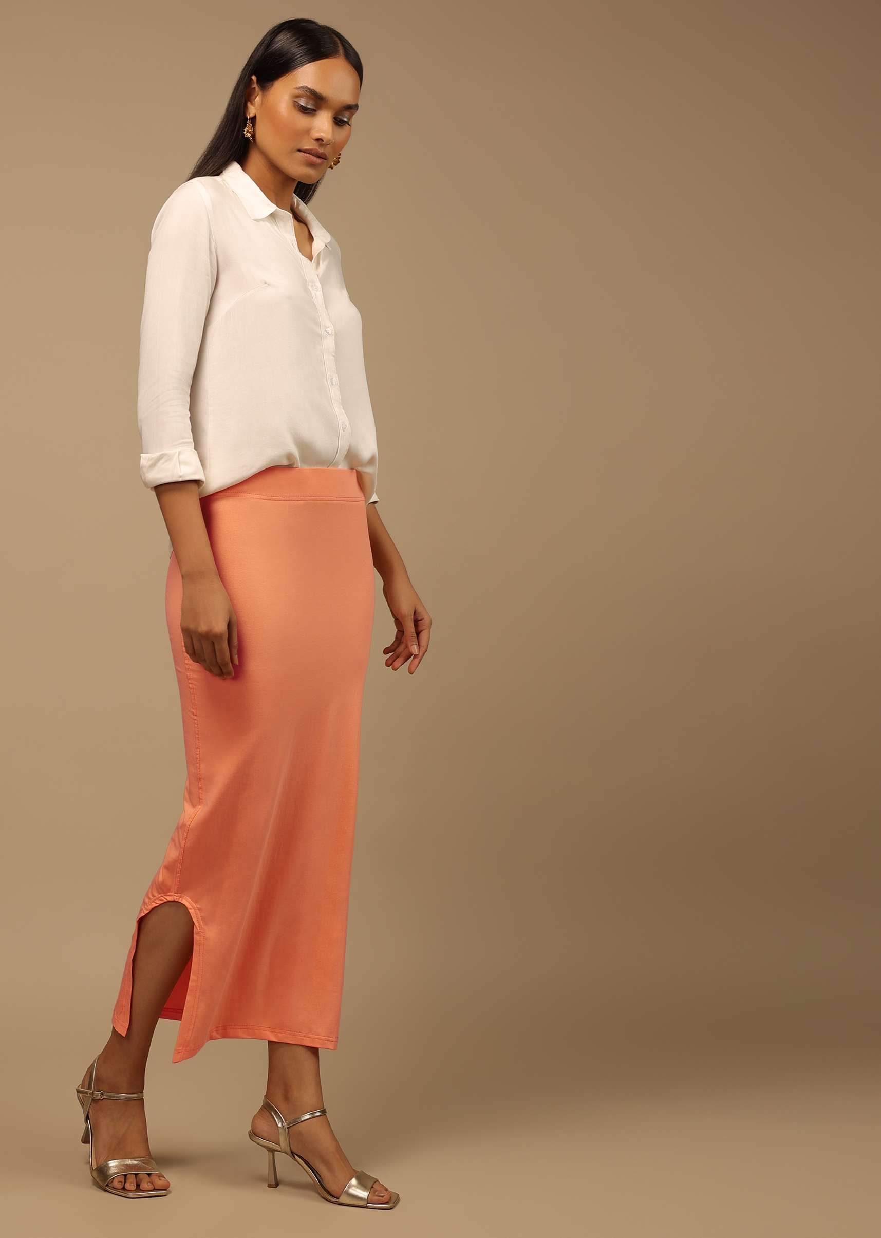 peach_shapewear_saree_petticoat_in_cotton_lycra_with_e_1_138a8d5a-125c-417e-b760-89bbdbccdad8.jpg
