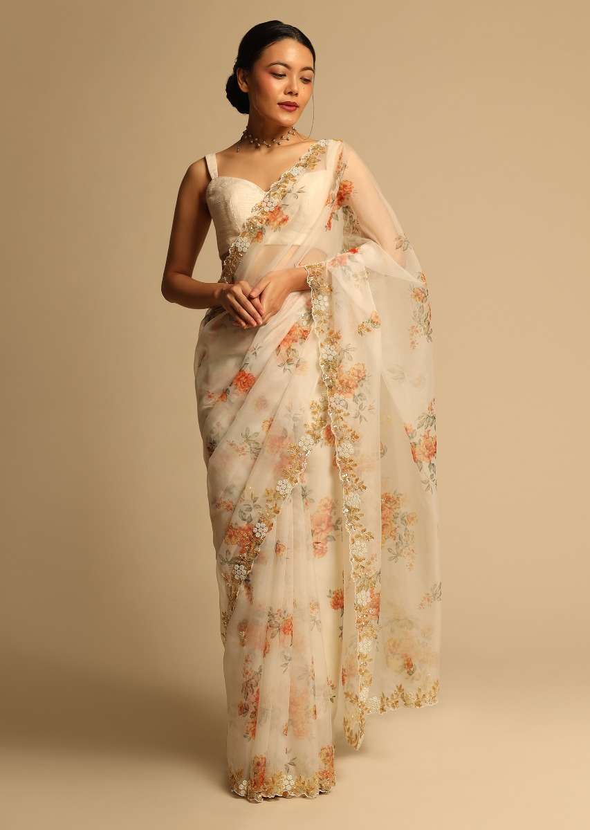 pearl-white-saree-in-organza-with-floral-print-all-over-and-moti-embroidered-border-along-with-unstitched-blouse-online-kalki-fashion-k07303613656y-sg63147_4_678bc53e-93e4-4e69-be77-fed42b8517ec.jpg