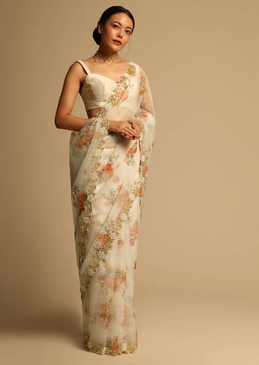 pearl-white-saree-in-organza-with-floral-print-all-over-and-moti-embroidered-border-along-with-unstitched-blouse-online-kalki-fashion-k07303613656y-sg63147_5_147b1957-ed06-4b64-892e-70ec51d07bd0.jpg